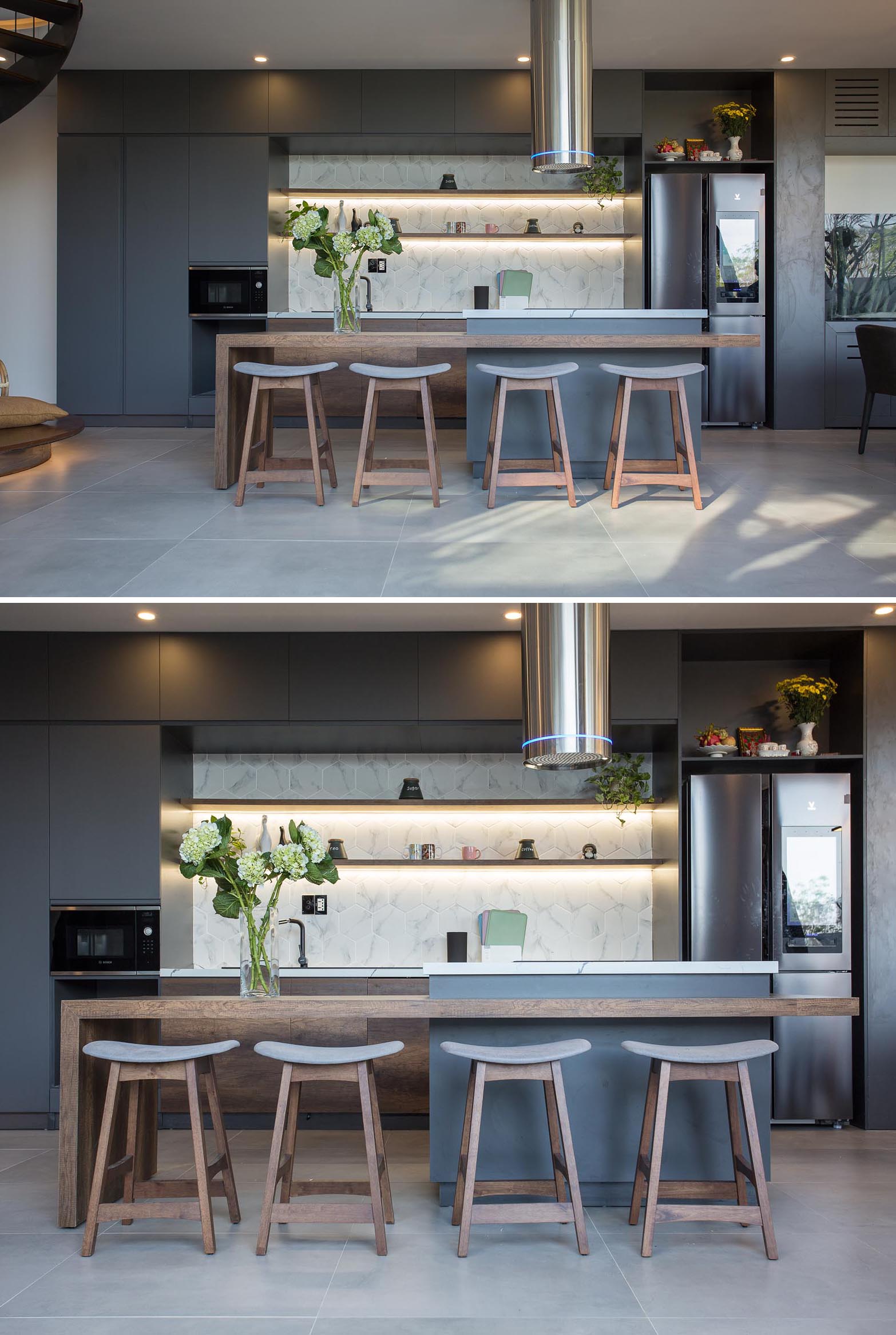 A modern kitchen with gray cabinets, light countertops, and wood accents.