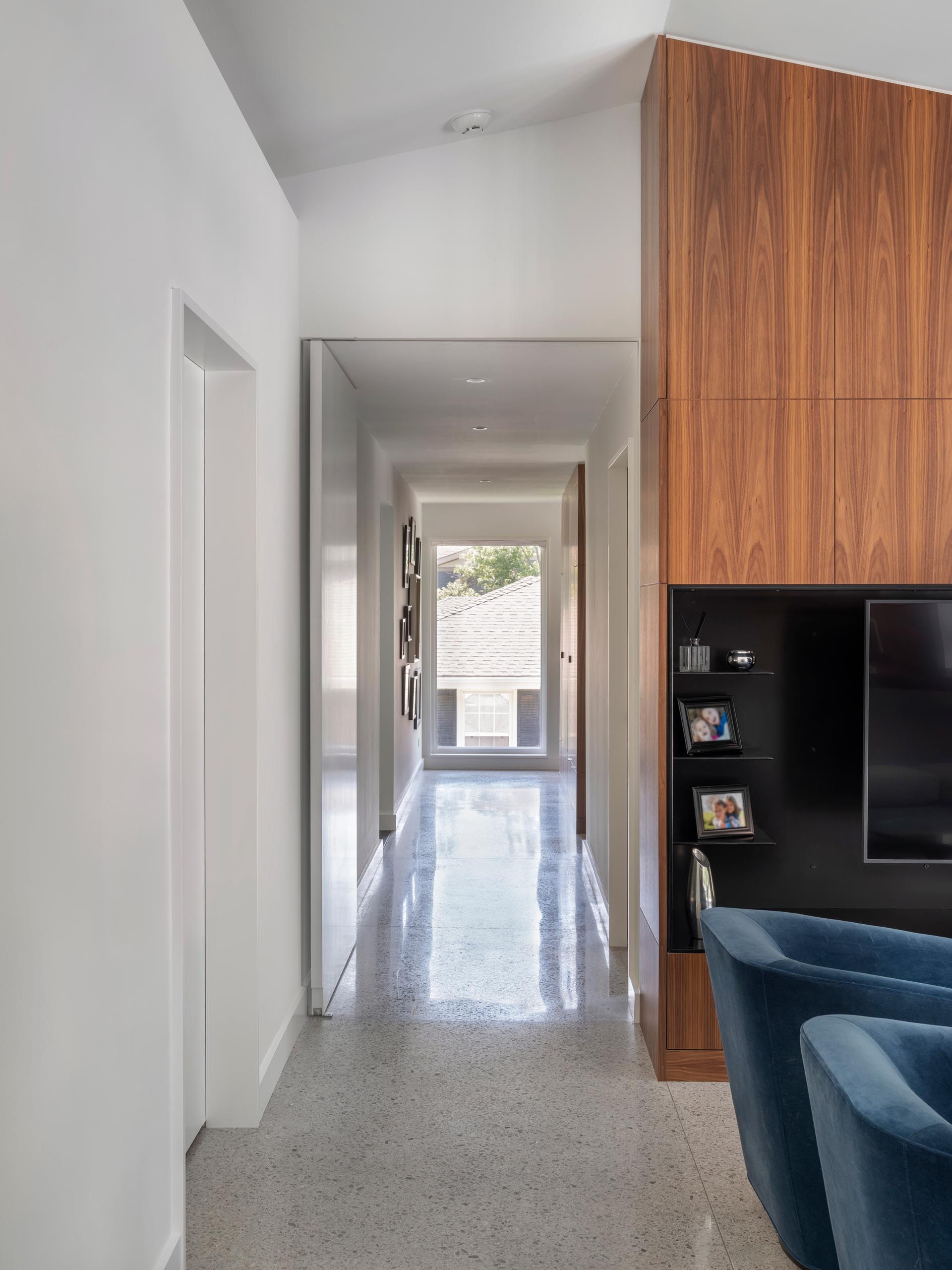 A modern mid-century inspired home with polished concrete floors.