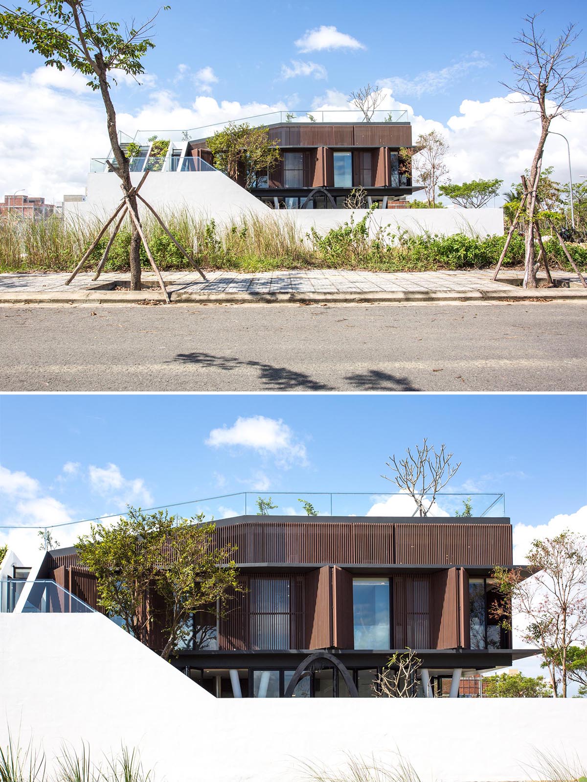This modern house has a wood exterior with folding shutters, that help to protect the home in the stormy season.