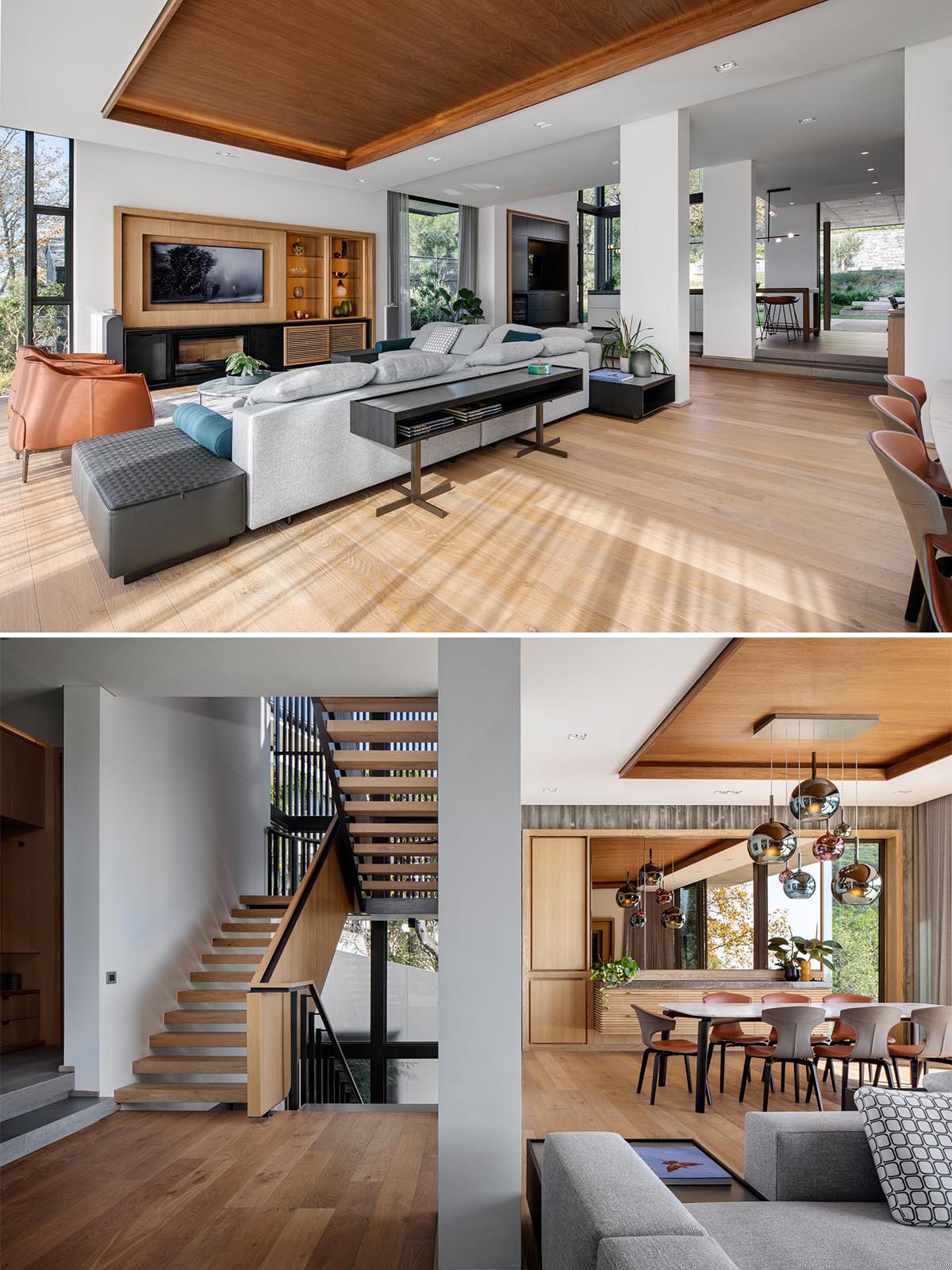 The open plan interior of this modern home includes a spacious living room and dining room, while a couple of steps leads up to the kitchen.