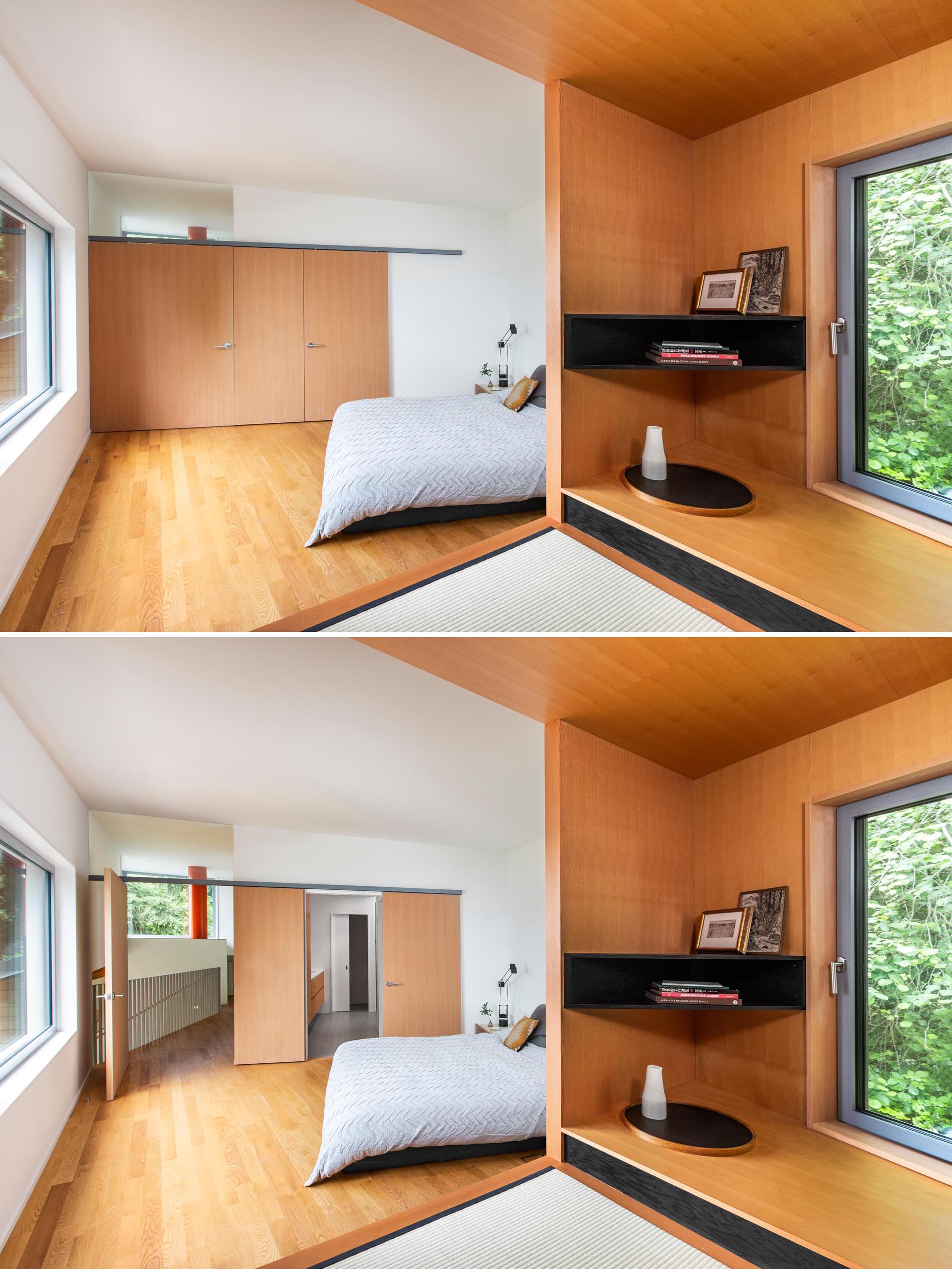 A pivoting bedroom door was made possible by the installation of a custom track that also enables a sliding bathroom door. Both the doors and a panel are made from fir.