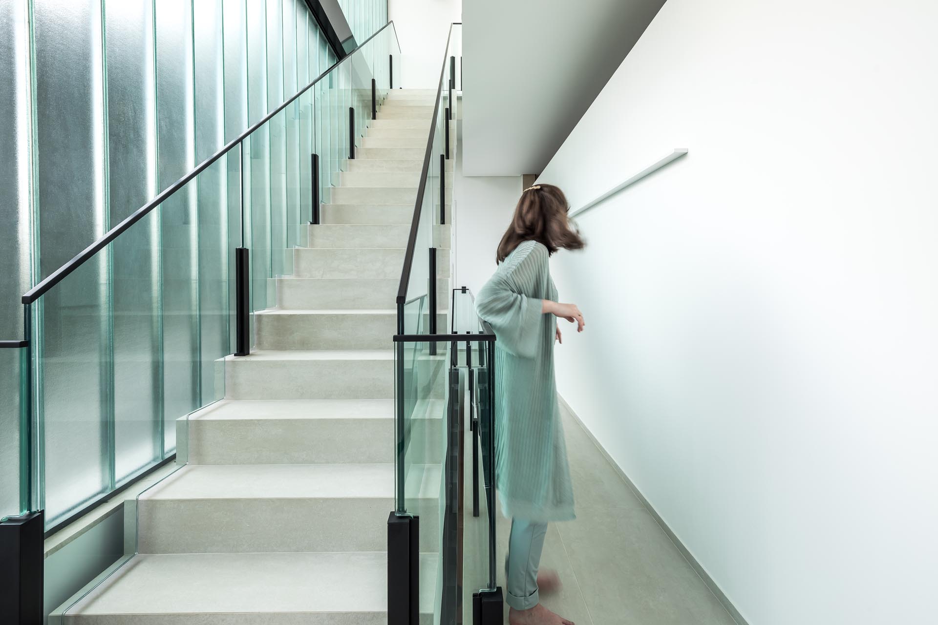 A modern staircase with skylights.