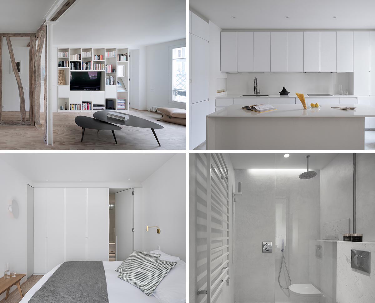 A modern white apartment with built-in shelving, a minimalist kitchen, and natural wood elements.