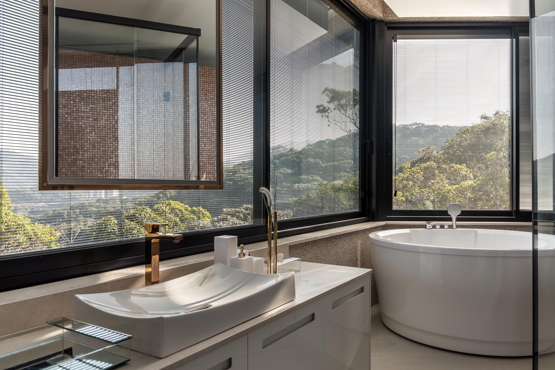 This bathroom has plenty of windows to maximize the views for the deep soaking tub and vanity area.