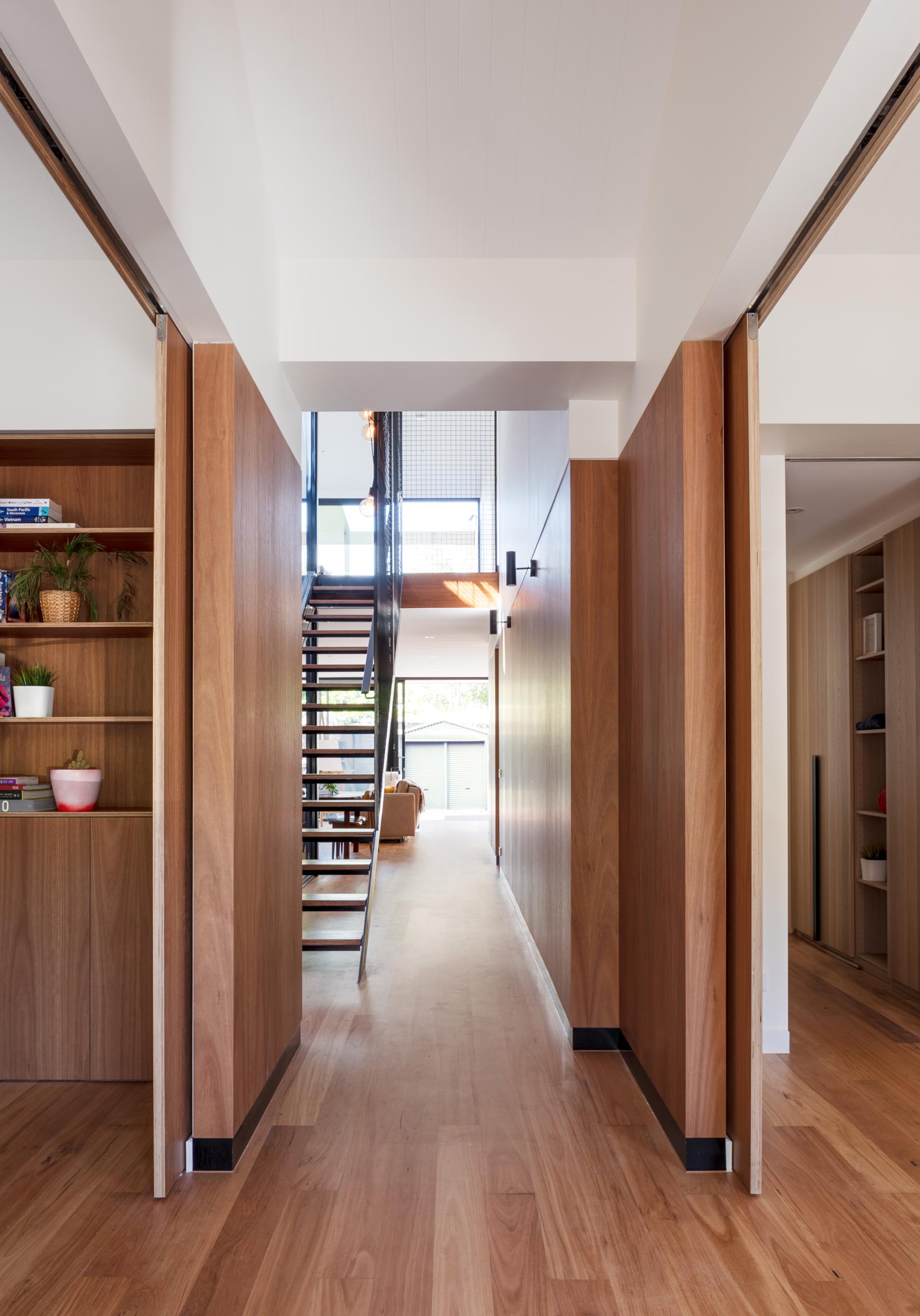 Blackbutt flooring is used throughout adding a warmth to this modern home interiors.