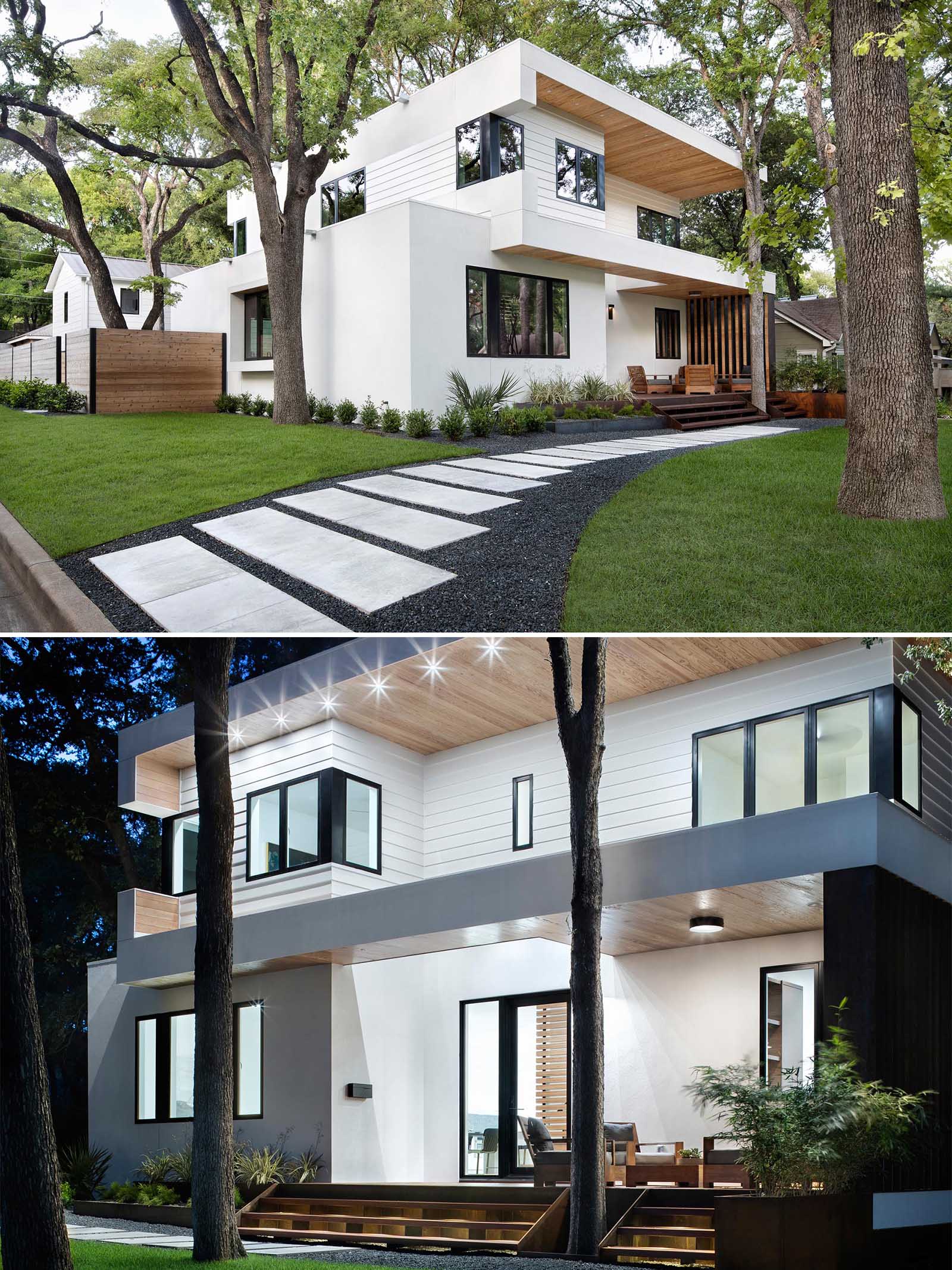 A modern home that has a bright white exterior with wood accents, a small porch, and landscaped front garden with a path.