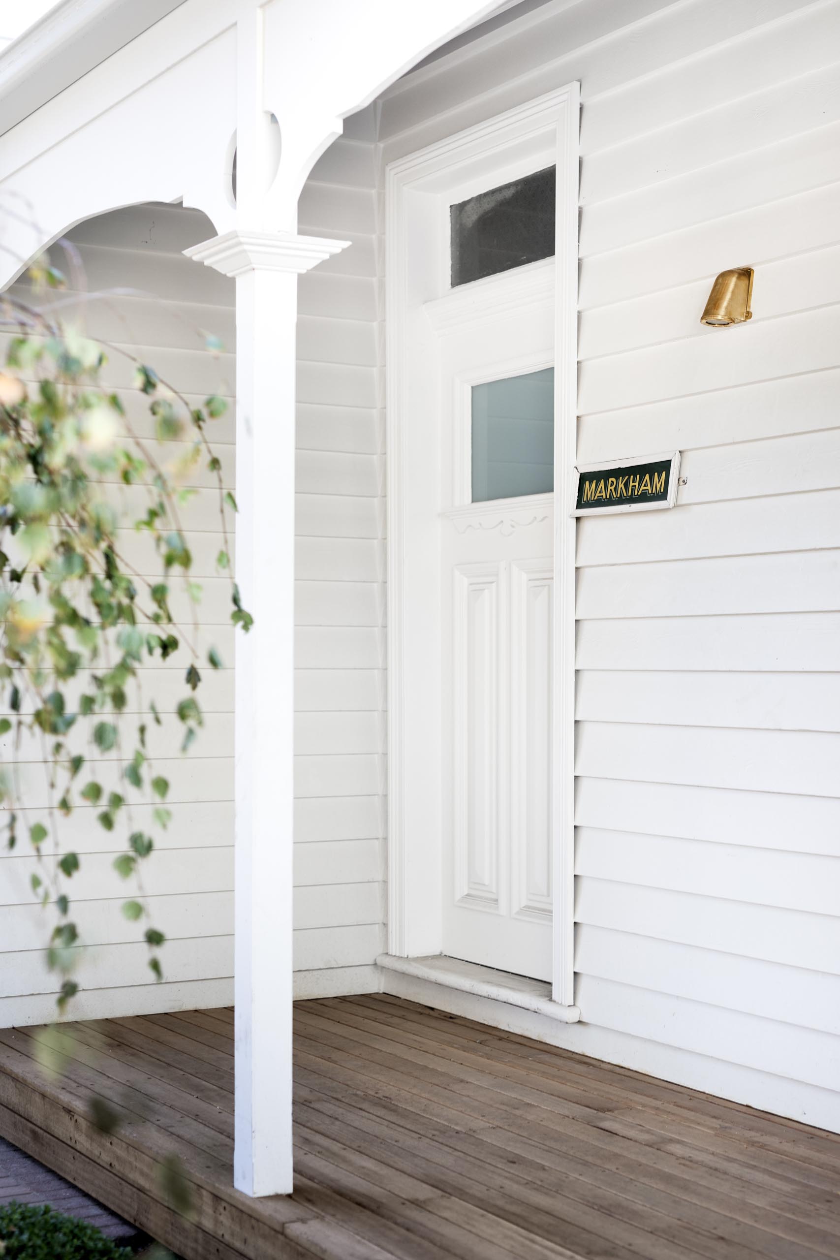 The front porch and door of an Australian heritage house.