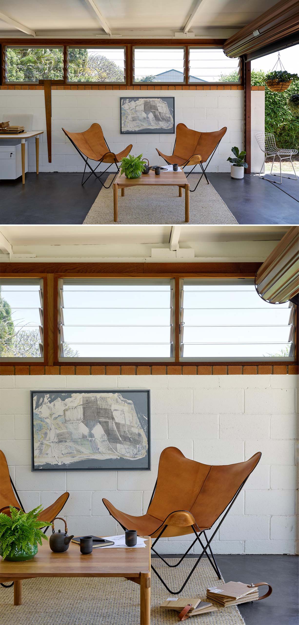 The white block walls of this concerted carport are contrasted by the brown leather chairs, wood coffee table, and dark concrete flooring.