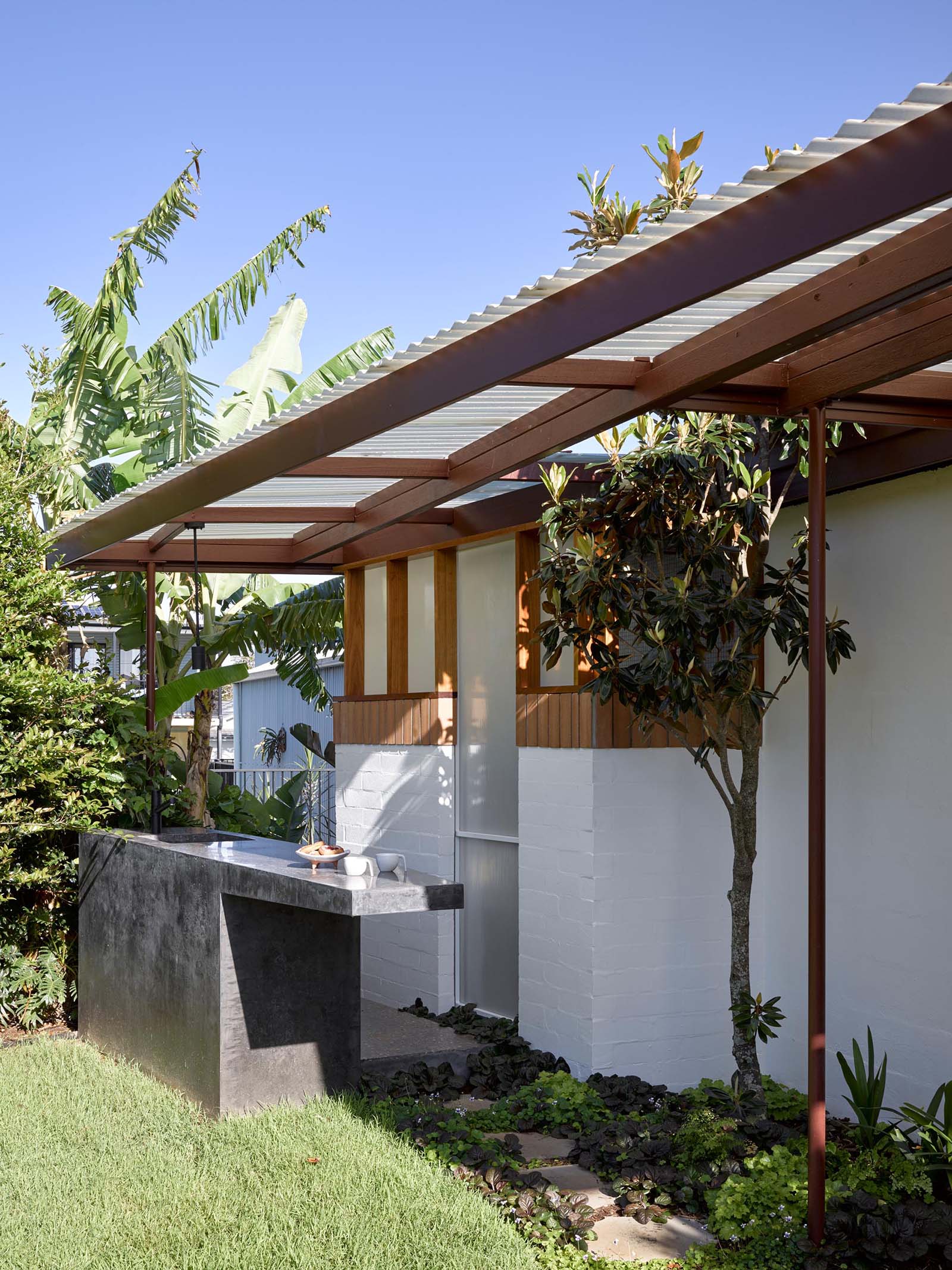 An outdoor kitchen made from concrete.