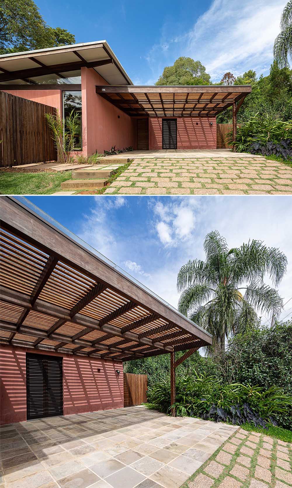 The modern house has a partially shaded carport at the front of the home.