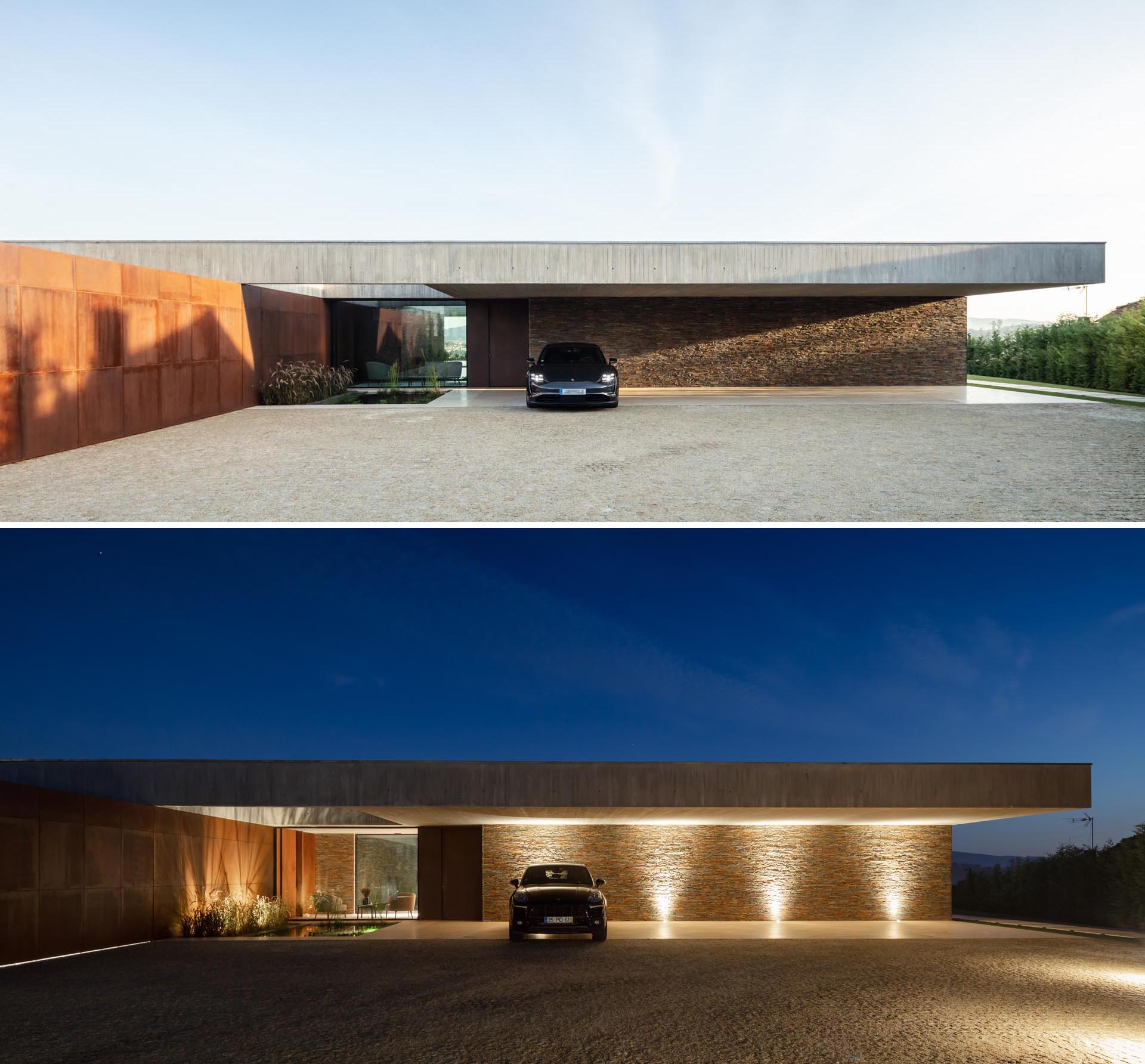 A modern concrete hone with weathered steel and stone accent walls, and lighting that highlights the covered parking area at night.