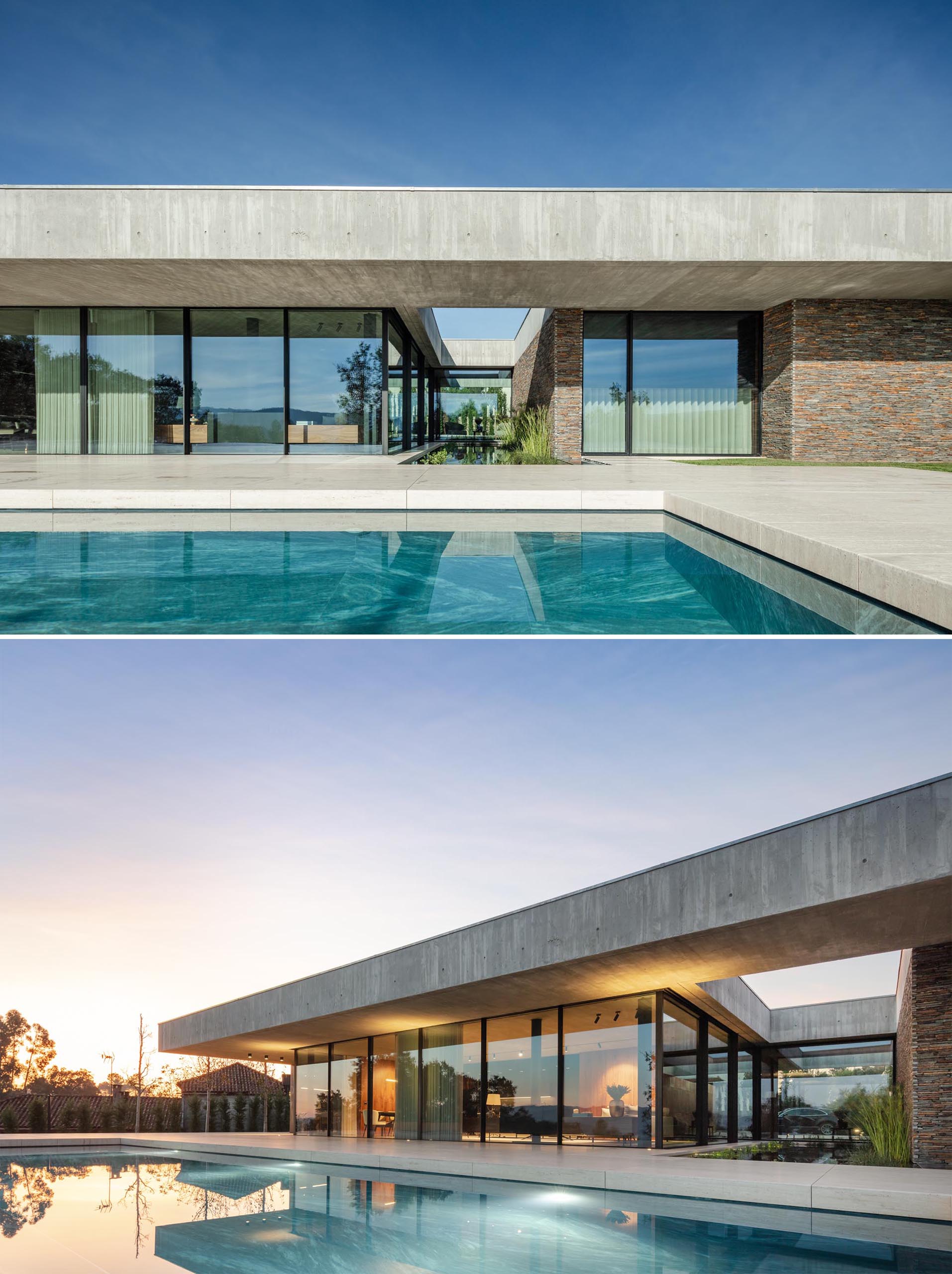 A modern concrete home with glass walls, an expansive patio, and a swimming pool.