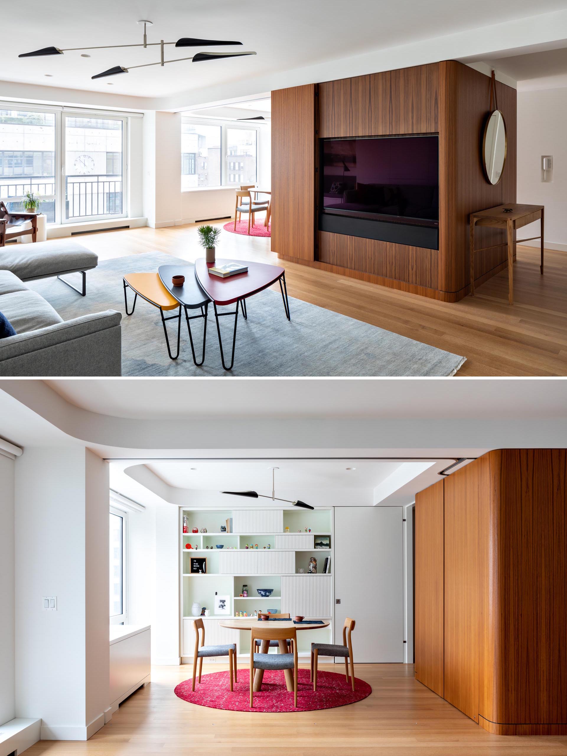 A modern apartment with teak panels that hide the TV, and a dining room with a white bookshelf.