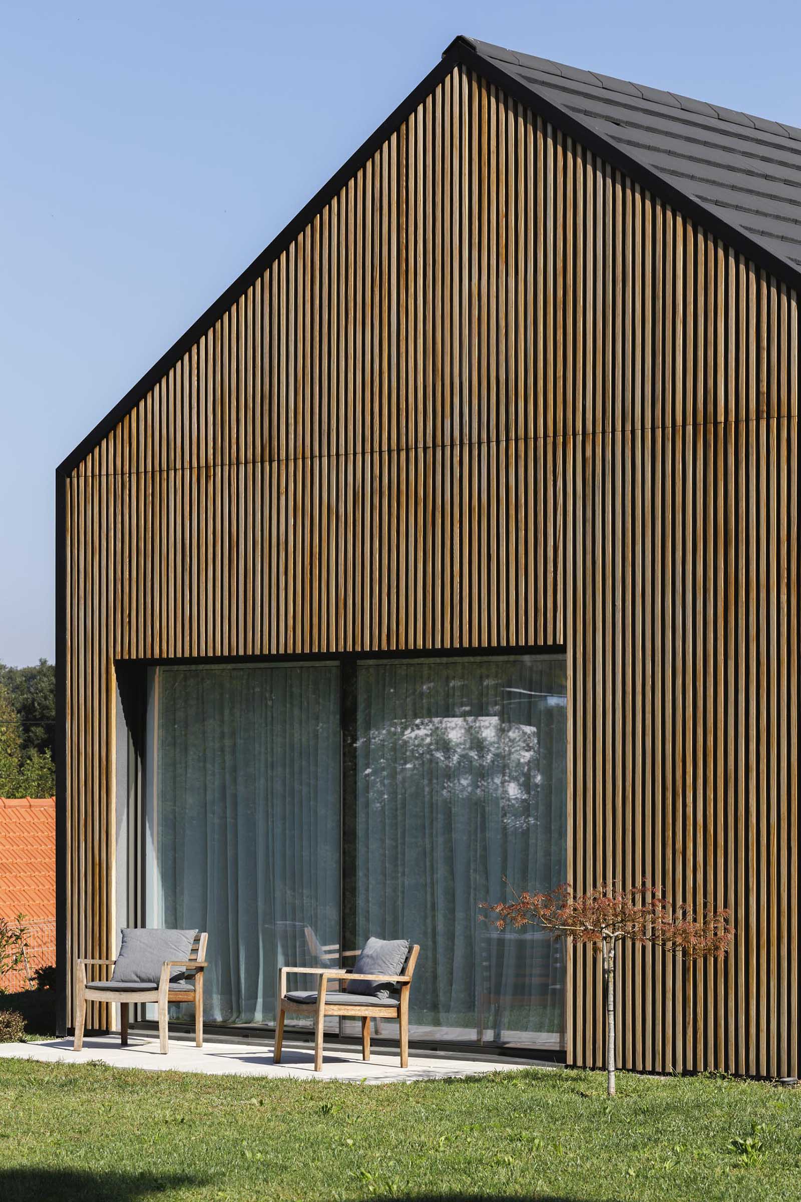 A modern house with a wood slat facade.