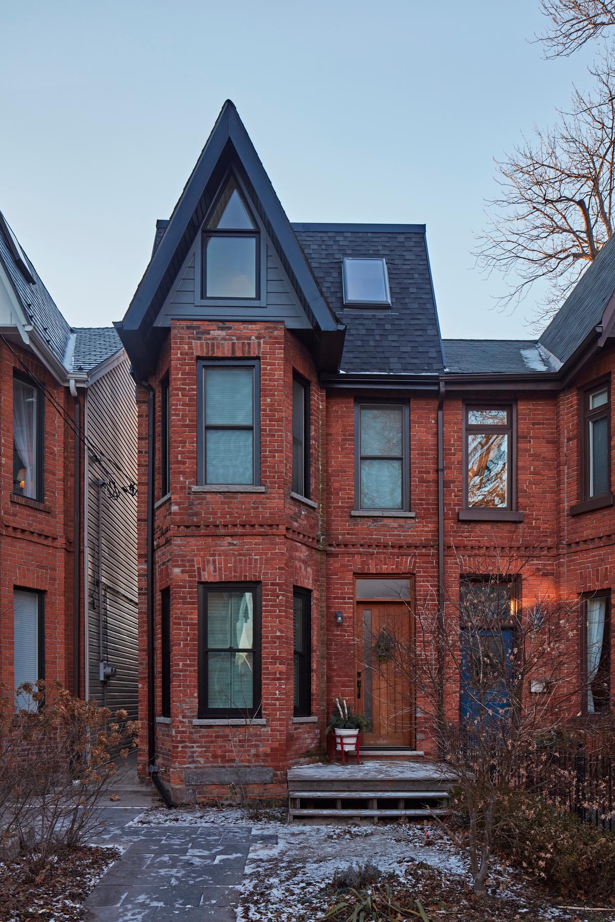 A modern extension was added to a Victorian home, creating a third floor with extra living space.