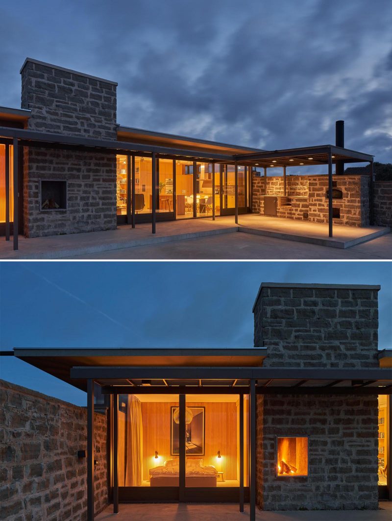 A modern summer home with glass and limestone walls.
