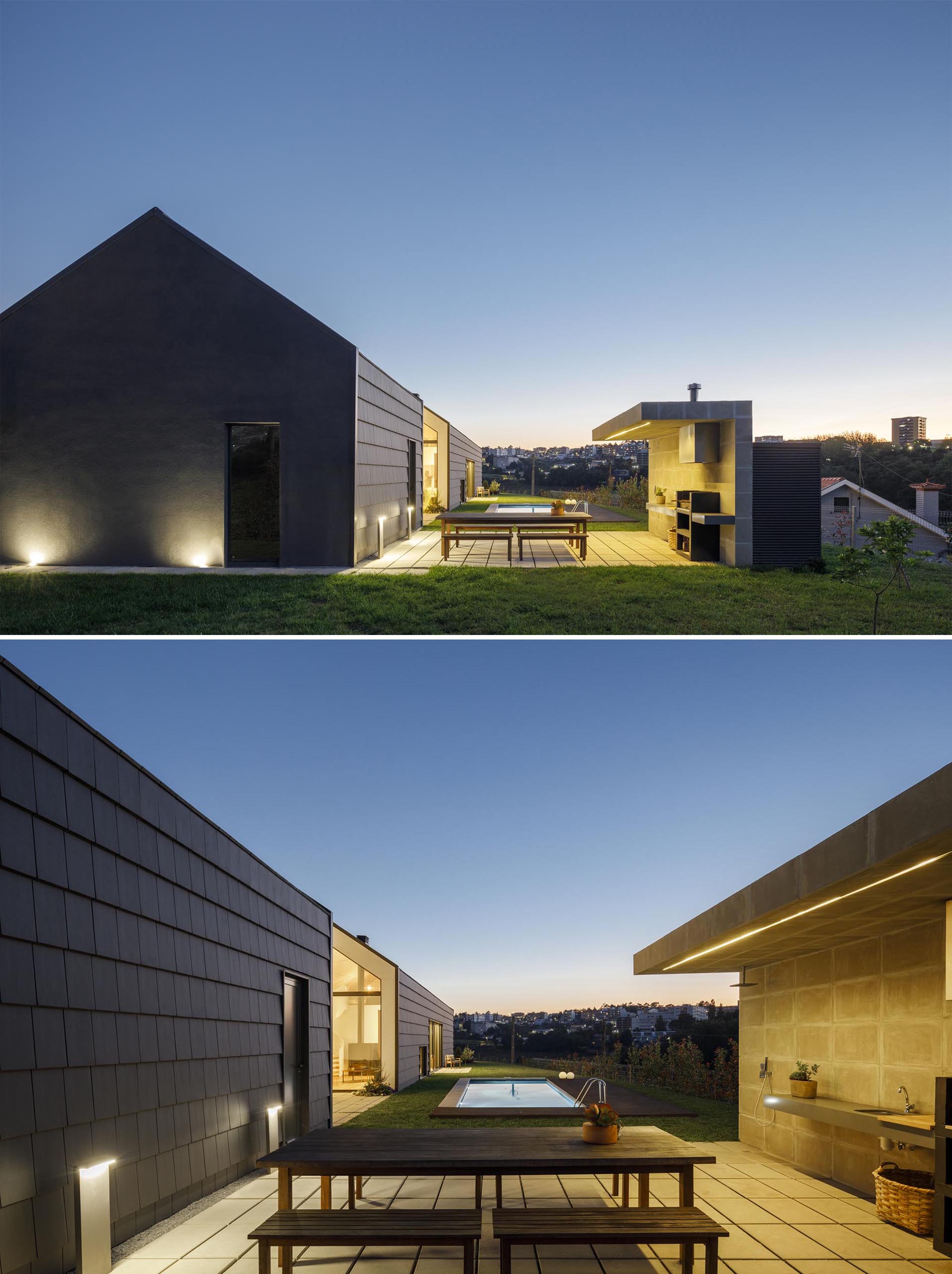 A modern house with a patio for outdoor dining and kitchen.