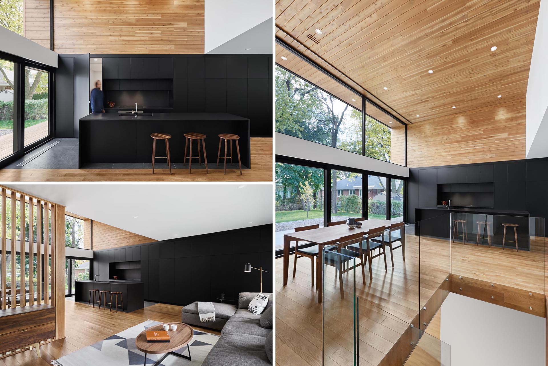 A modern matte black kitchen with integrated appliances and black countertops.