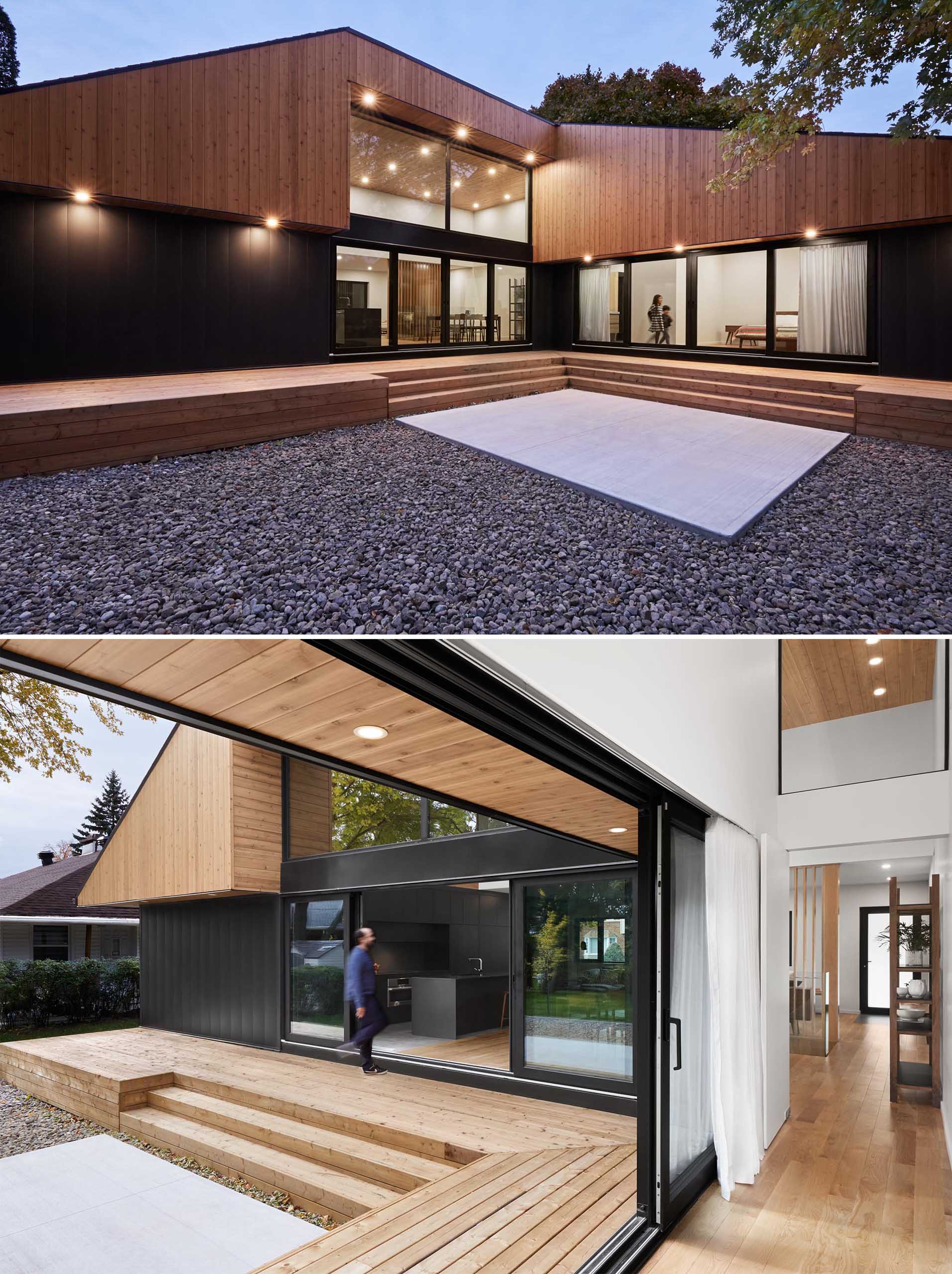 A modern home with high ceilings, and a black framed sliding lass door.