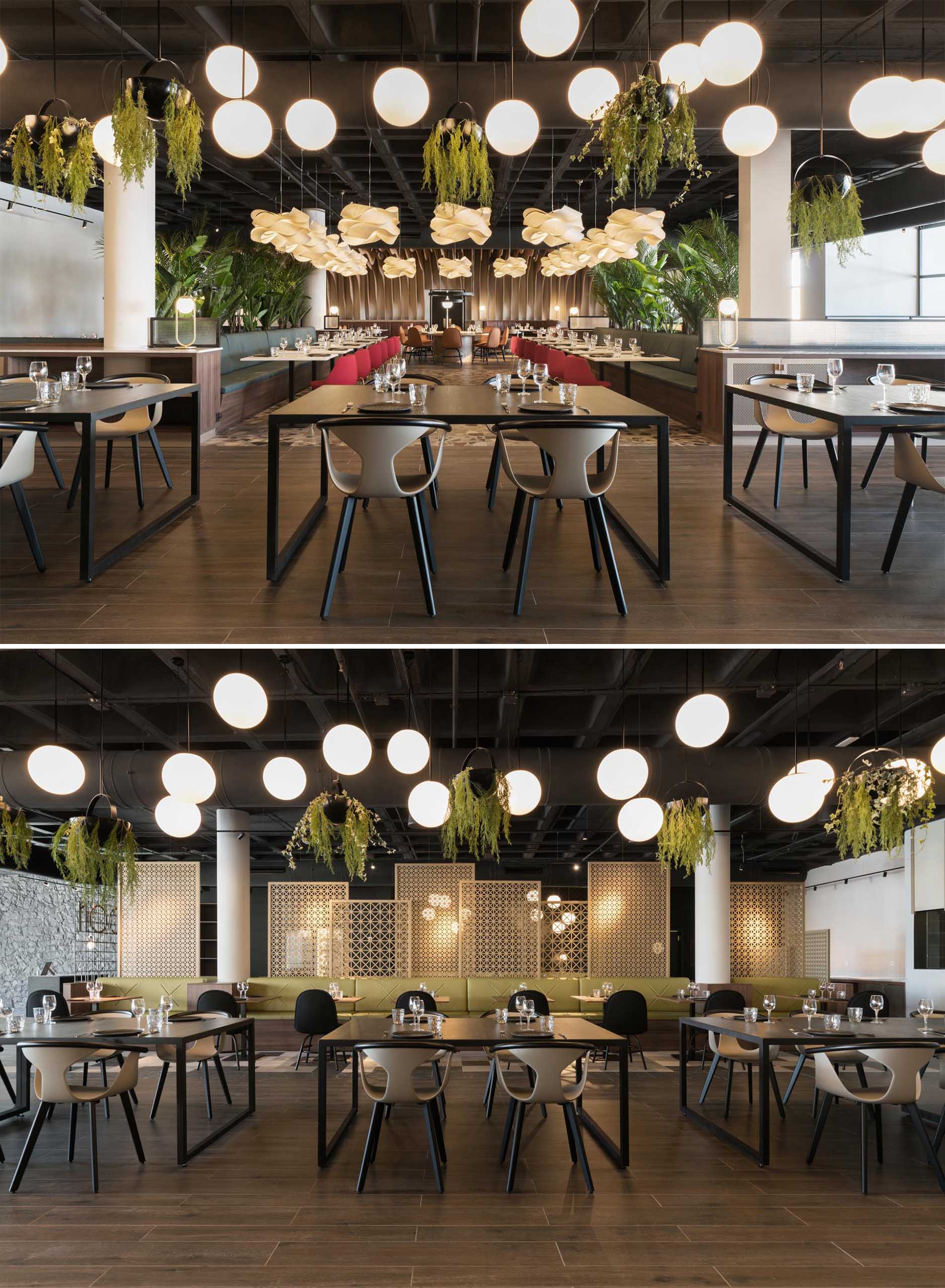 A modern restaurant with greenery, multiple seating areas, and plenty of lighting.