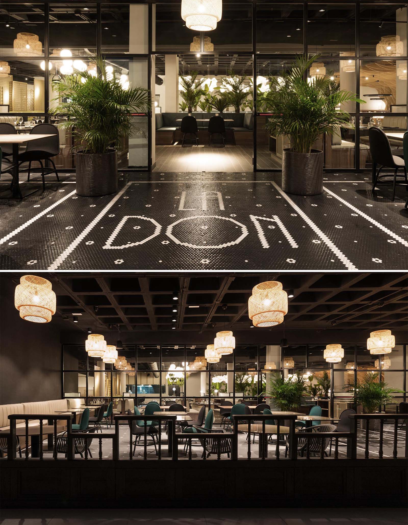 A modern restaurant with the name spelt out in black and white floor tiles.