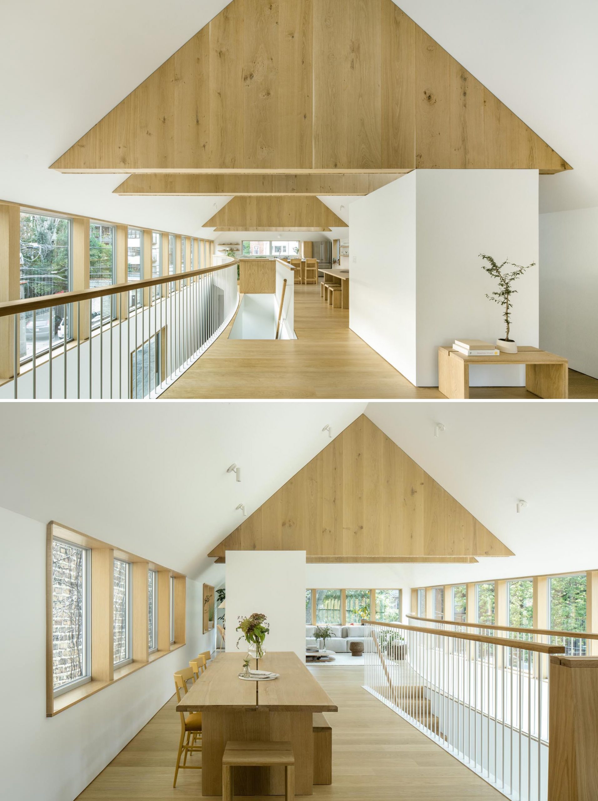 The dining room is centrally located on the upper floor of this modern home, while the flooring and other wood elements like the trusses are made from white oak.