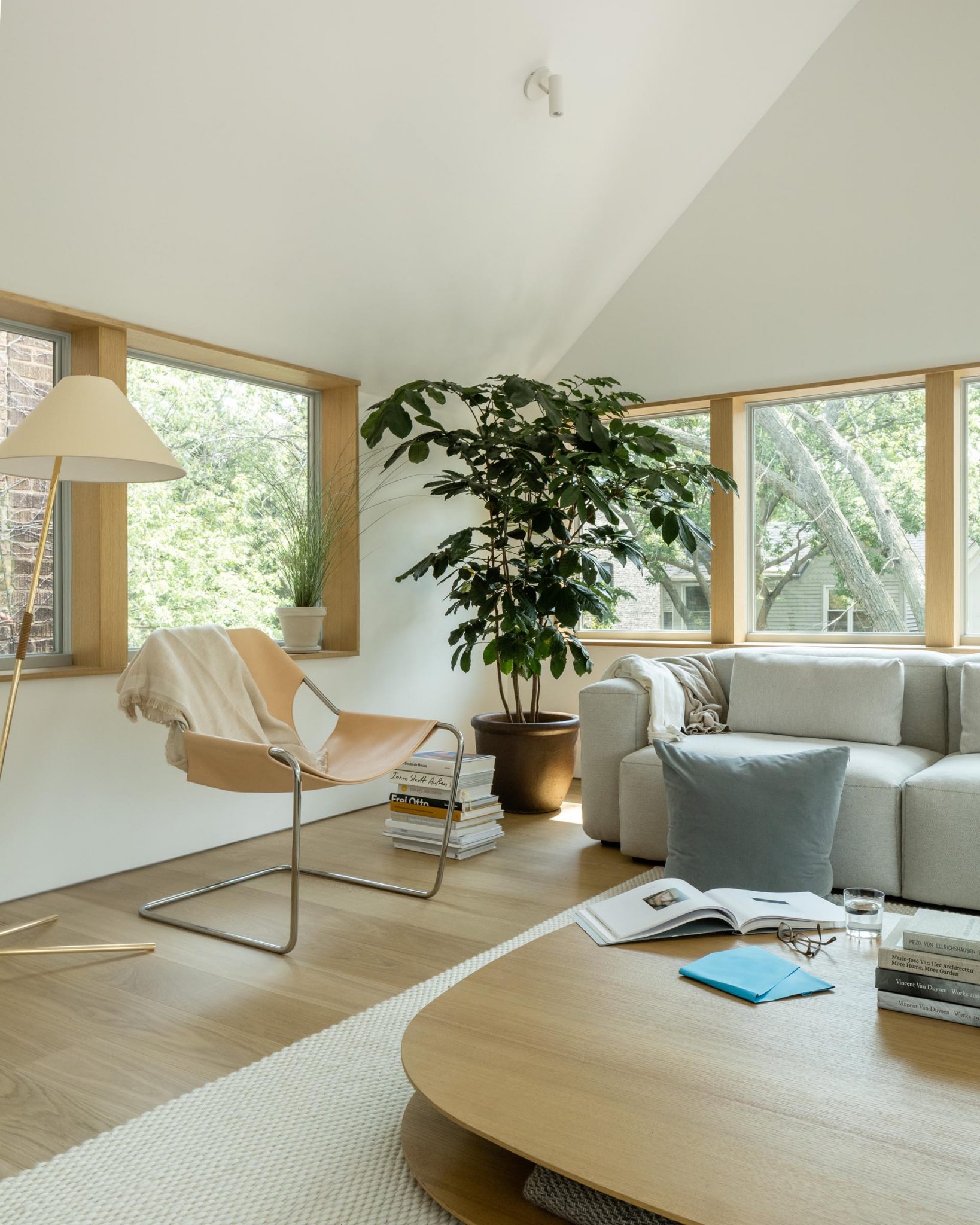 A Palette Of White Walls And Warm Wood Keeps This Interior Bright