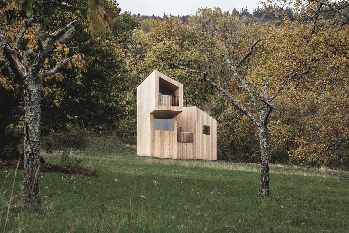 A small wood cabin designed as part of a hotel in France.