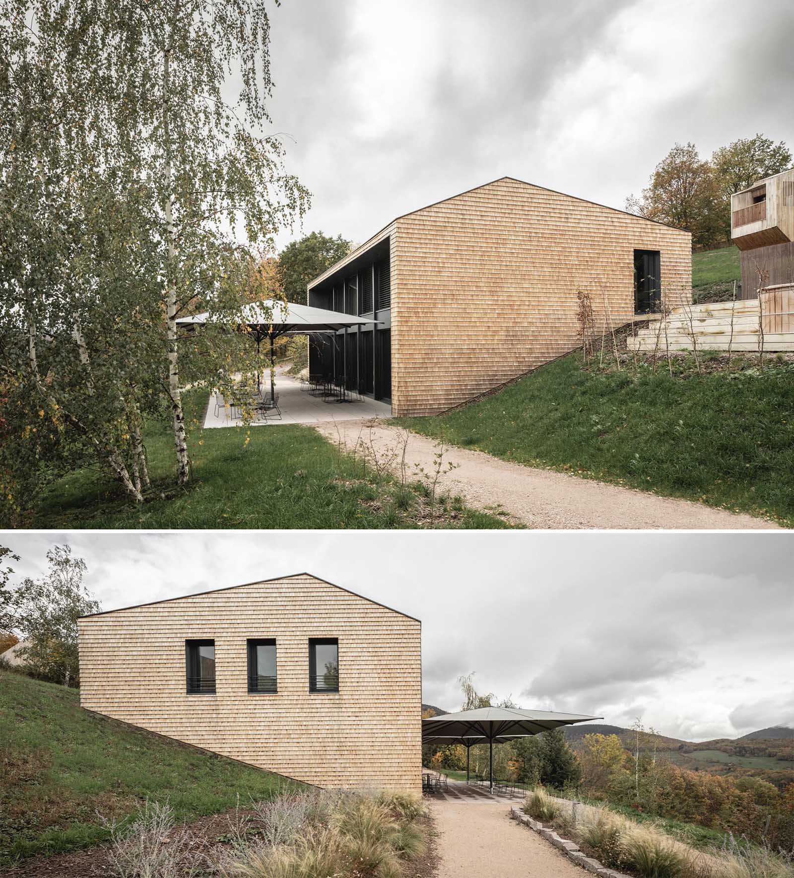 A modern hotel building, whose exterior is wrapped in Alsatian chestnut shingles, and includes a reception, restaurant, and spa, as well as the director's apartment.