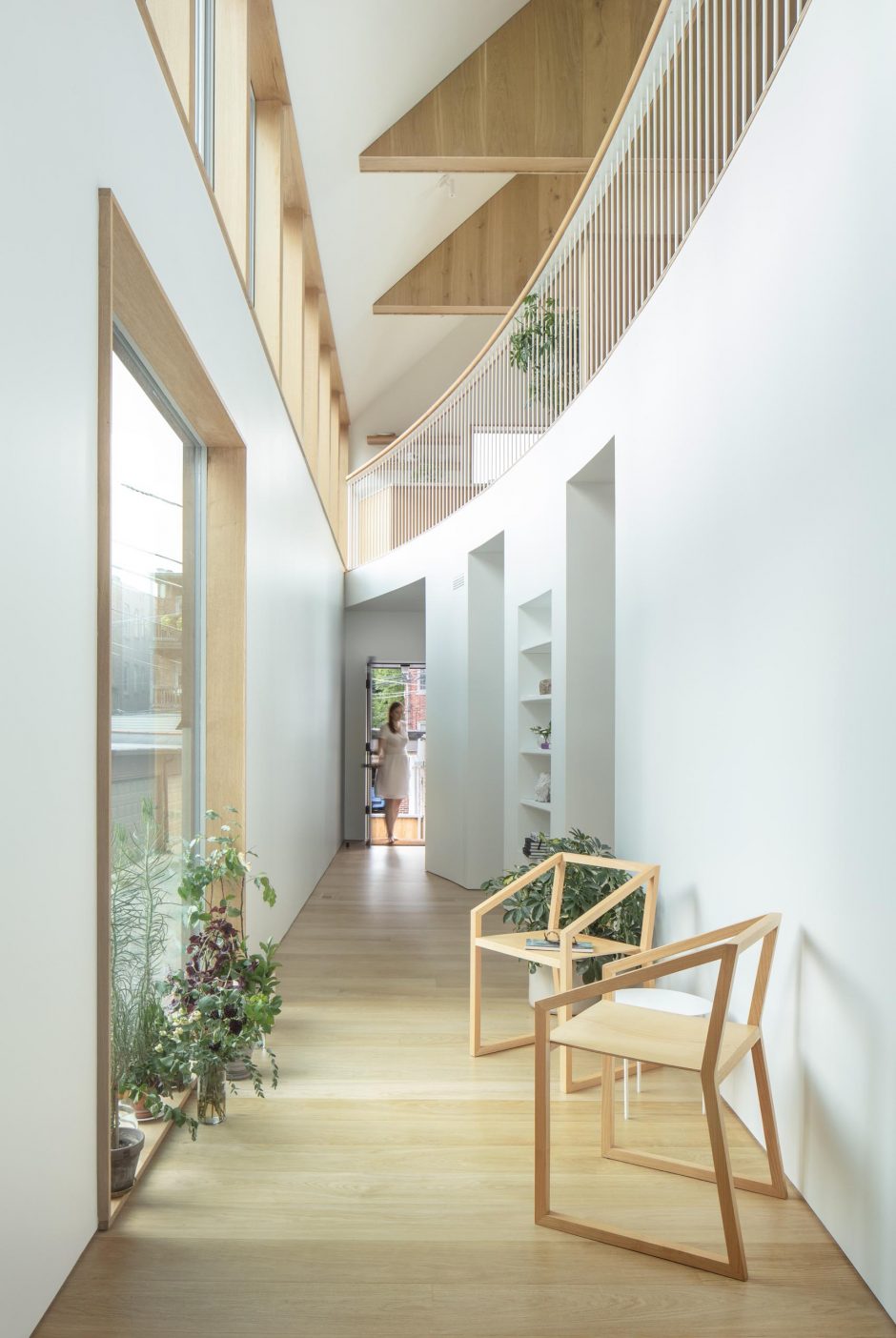A Palette Of White Walls And Warm Wood Keeps This Interior Bright