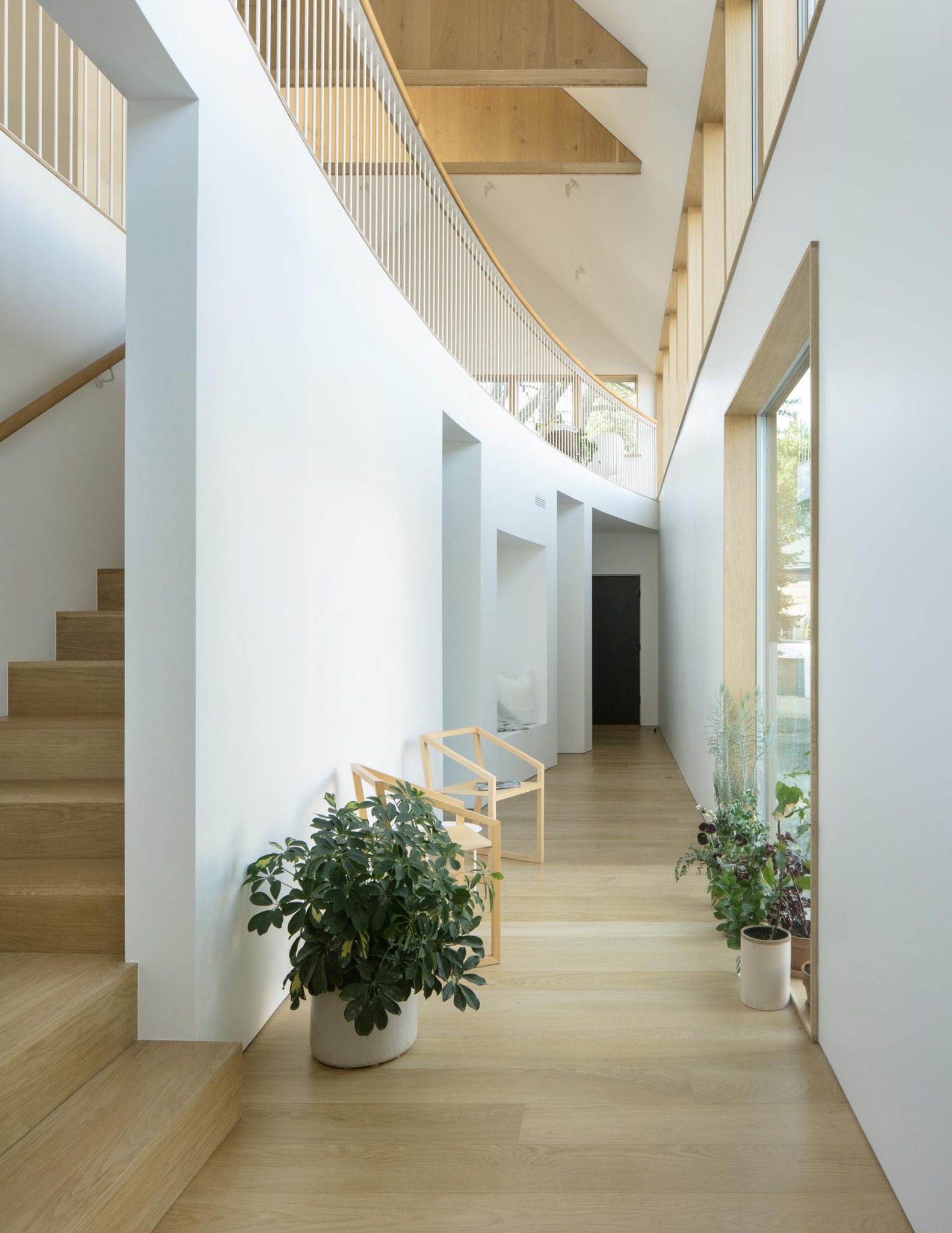 A Palette Of White Walls And Warm Wood Keeps This Interior Bright