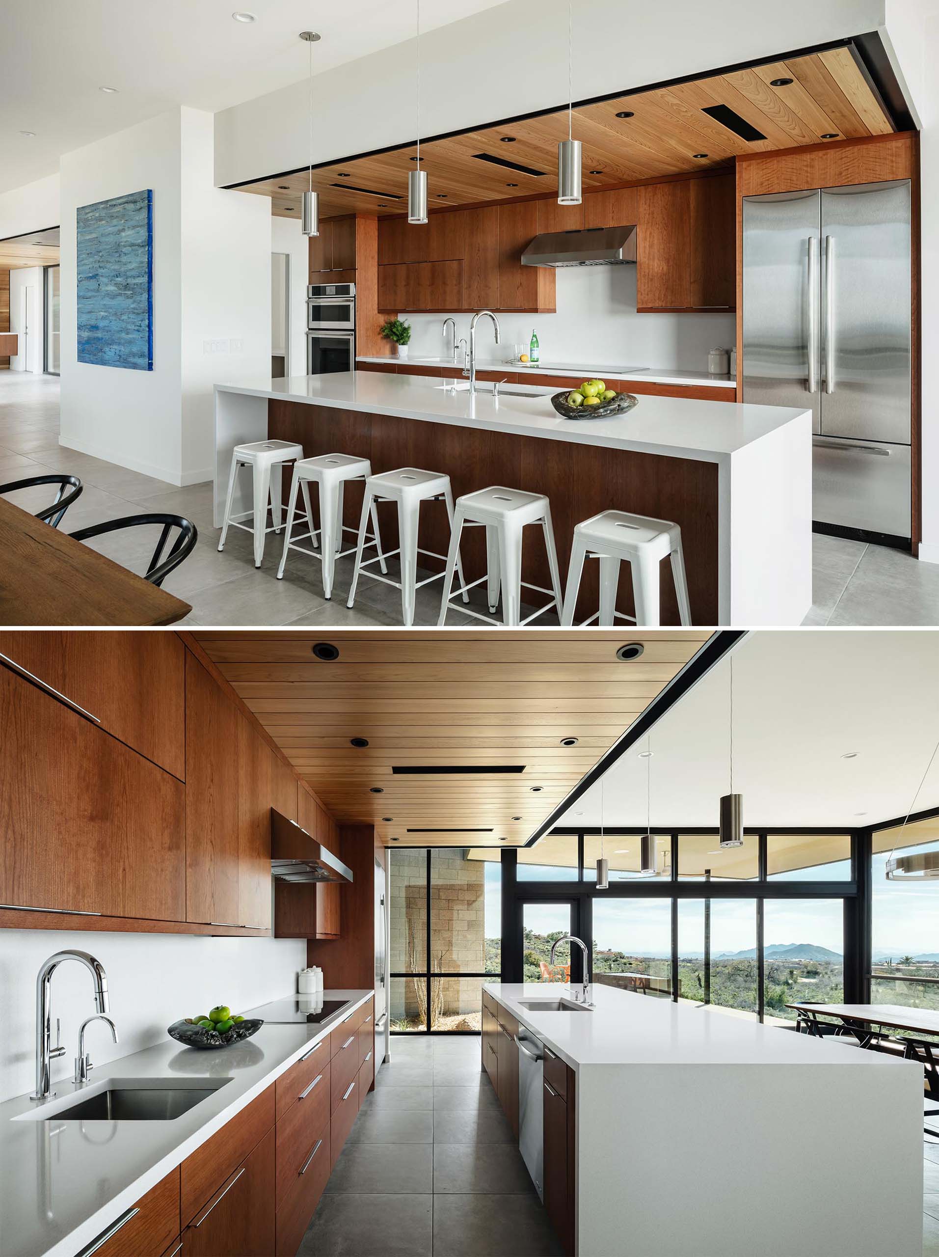 This modern kitchen features a floating cedar ceiling that aligns with the entry ceiling beyond. There's also cherry veneer cabinets and quartz countertops.