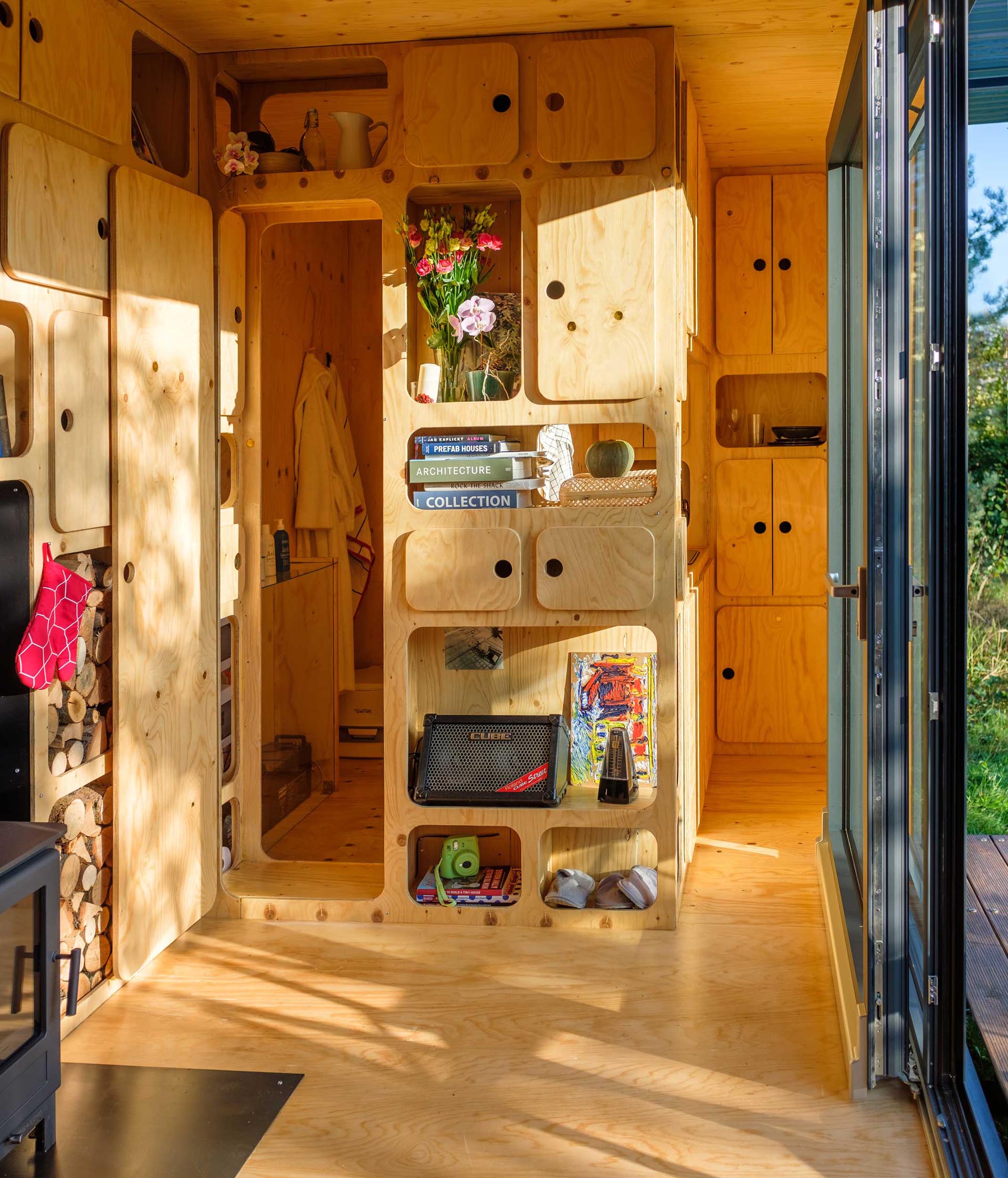 A tiny home with plenty of plywood cabinetry.