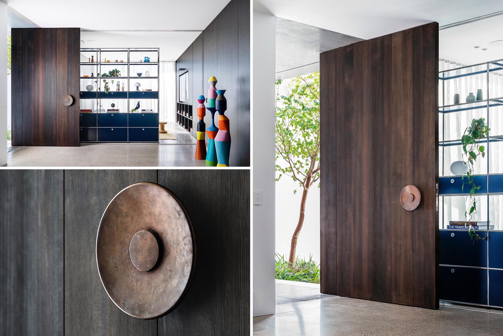 An oversized floor-to-ceiling dark pivoting timber front door welcomes guests to this modern home.