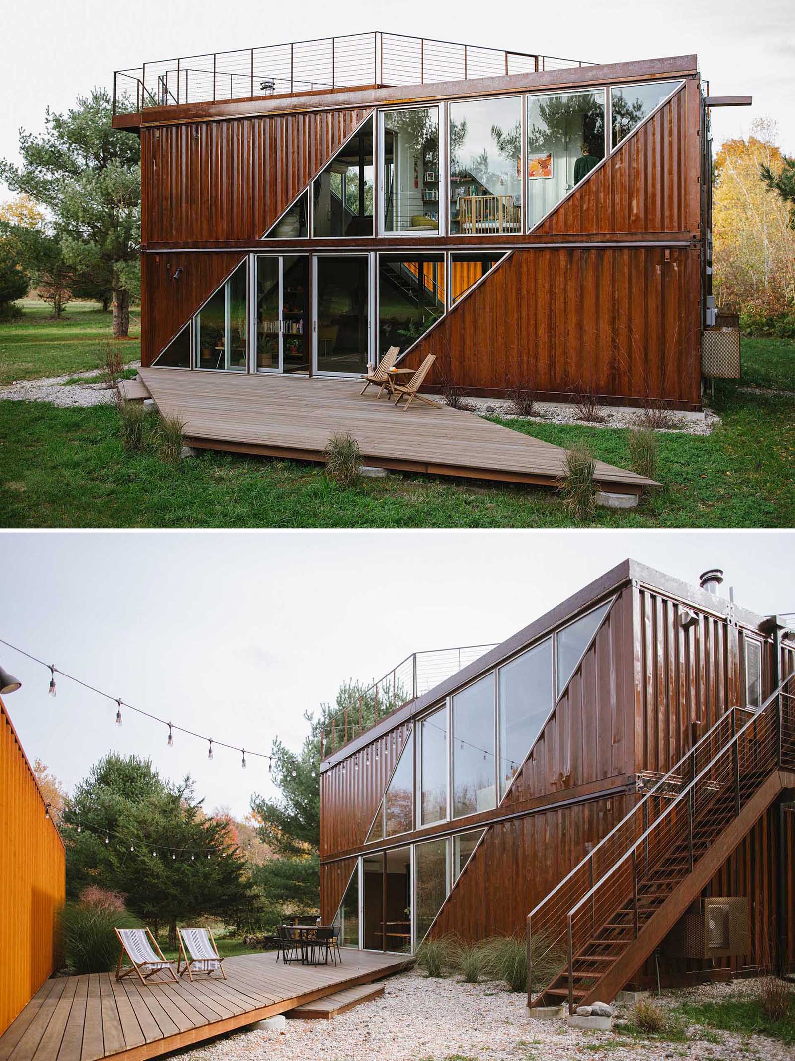 A modern shipping container home with two levels and outdoor decks.