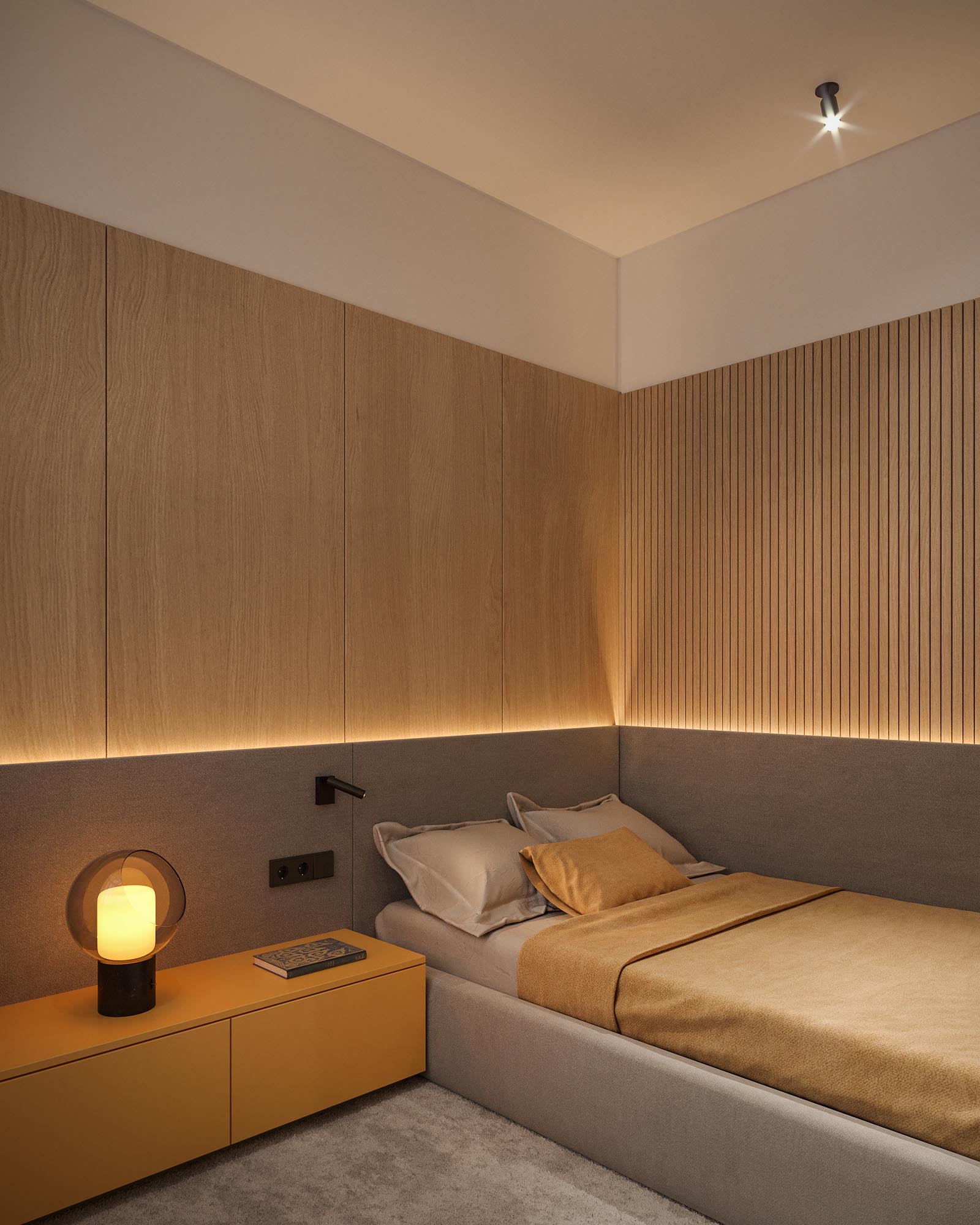 A modern bedroom with a backlit headboard and partial wood accent wall.