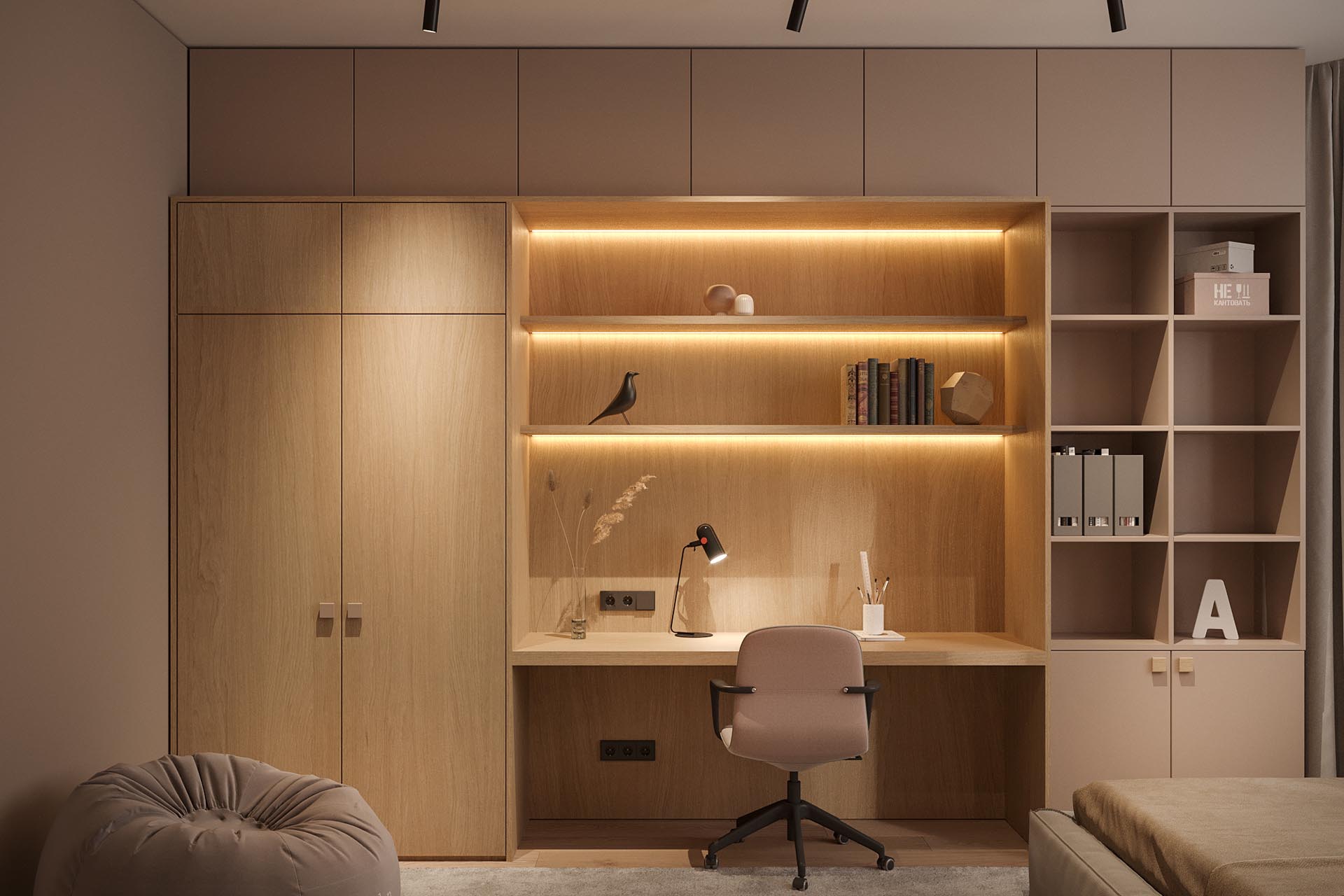 A modern built-in home office surrounded by bookshelves and closets, also has the shelving with hidden lighting.