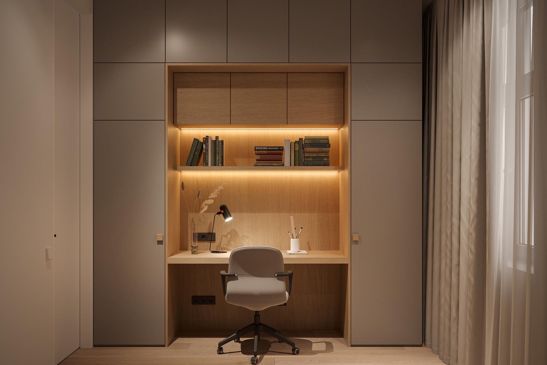A modern built-in home office surrounded by bookshelves and closets, also has the shelving with hidden lighting.