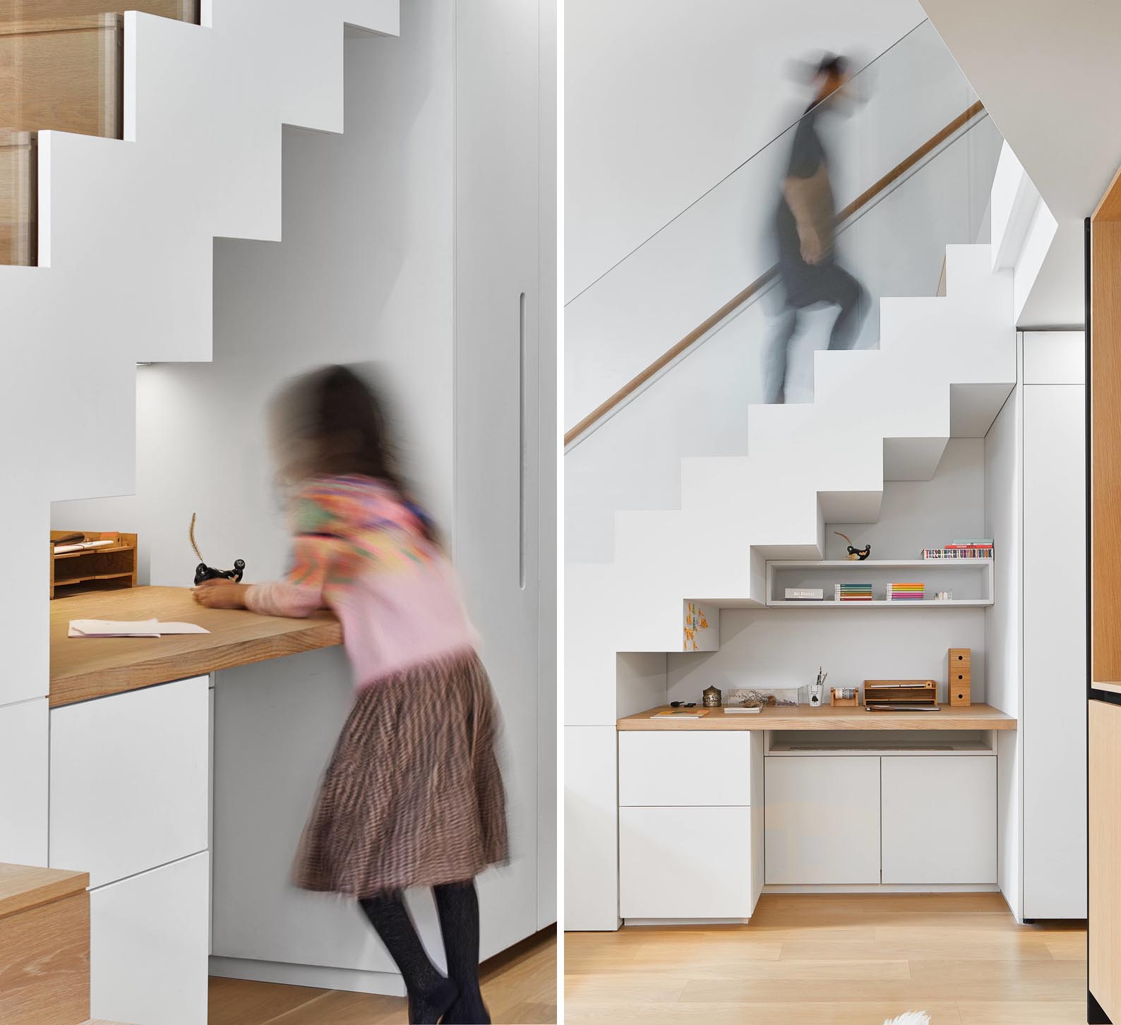 A modern loft apartment with a built-in desk under the stairs.