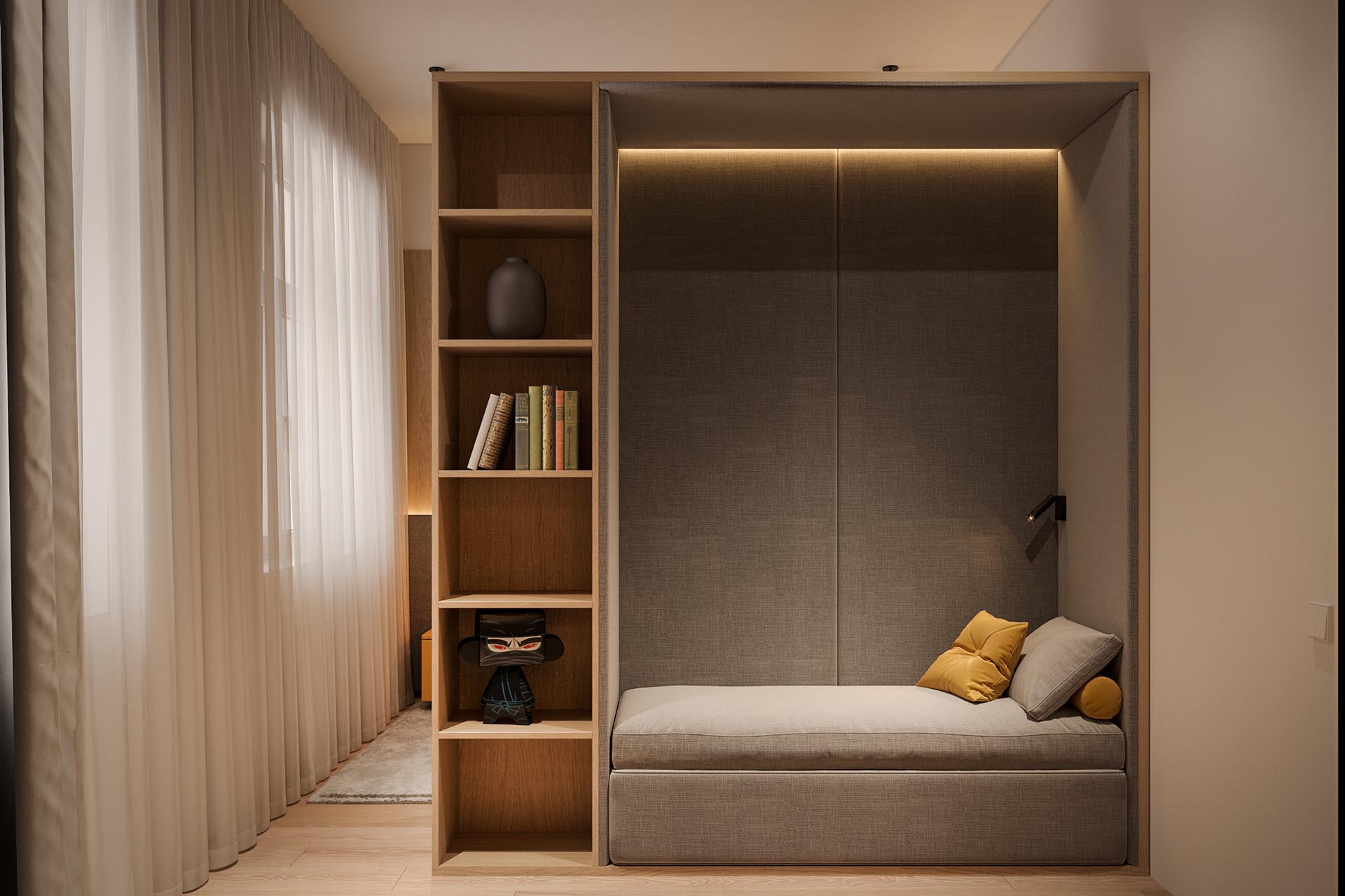 A built-in reading nook is lined with gray upholstered walls, making it a cozy and private space.