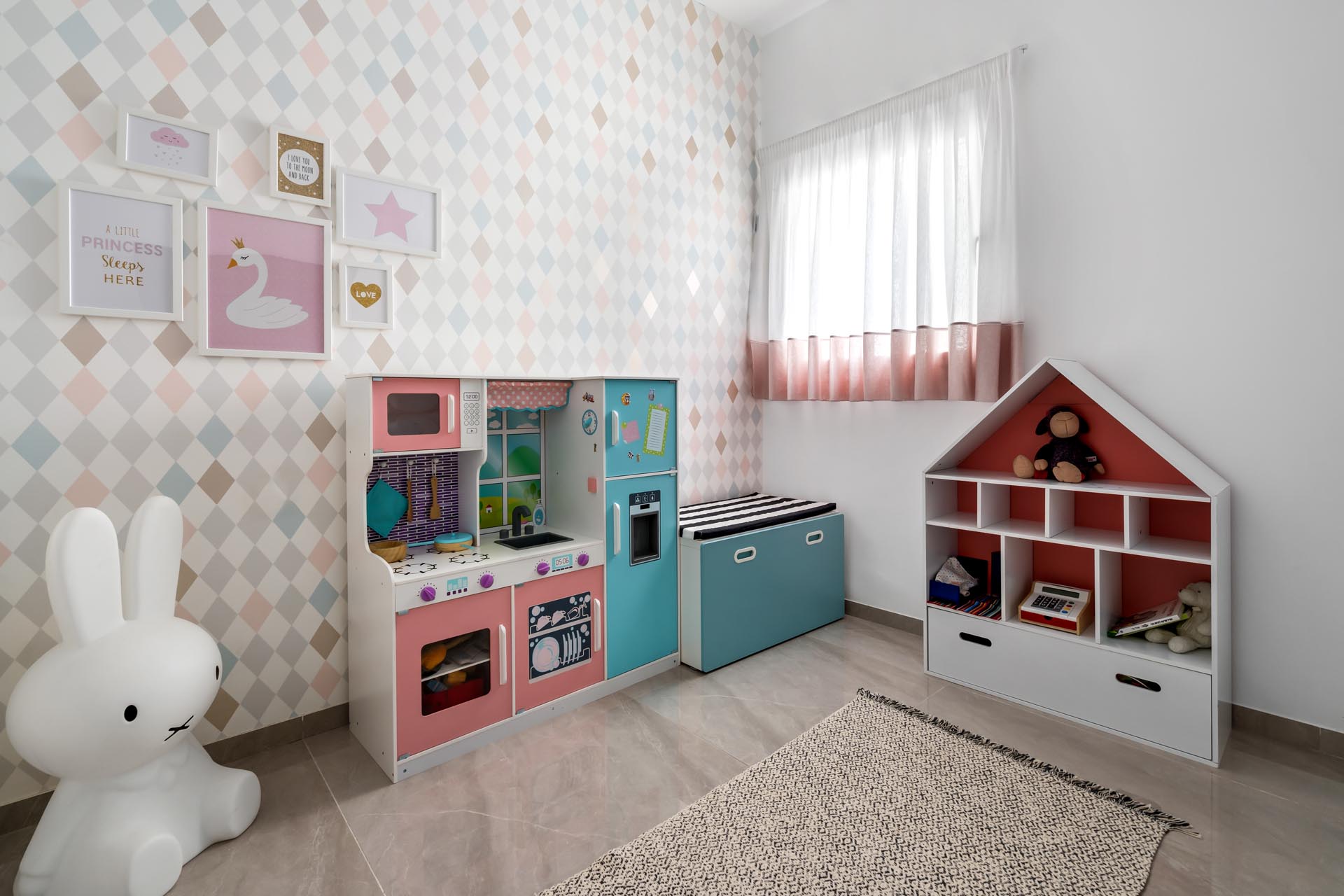 A modern playroom incorporates different shades of pink.