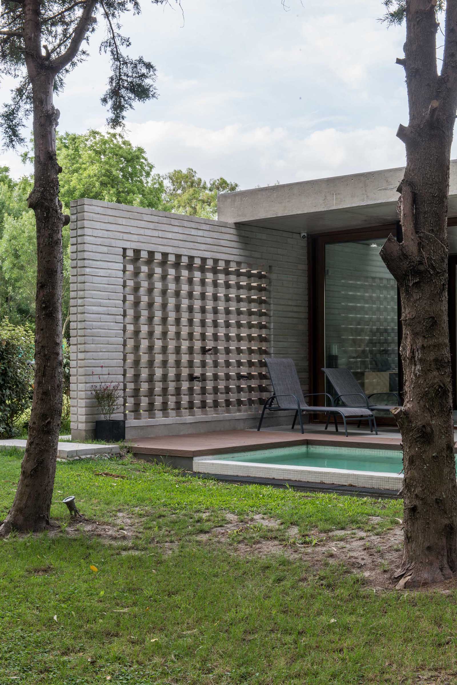 A modern concrete block wall that provides privacy.