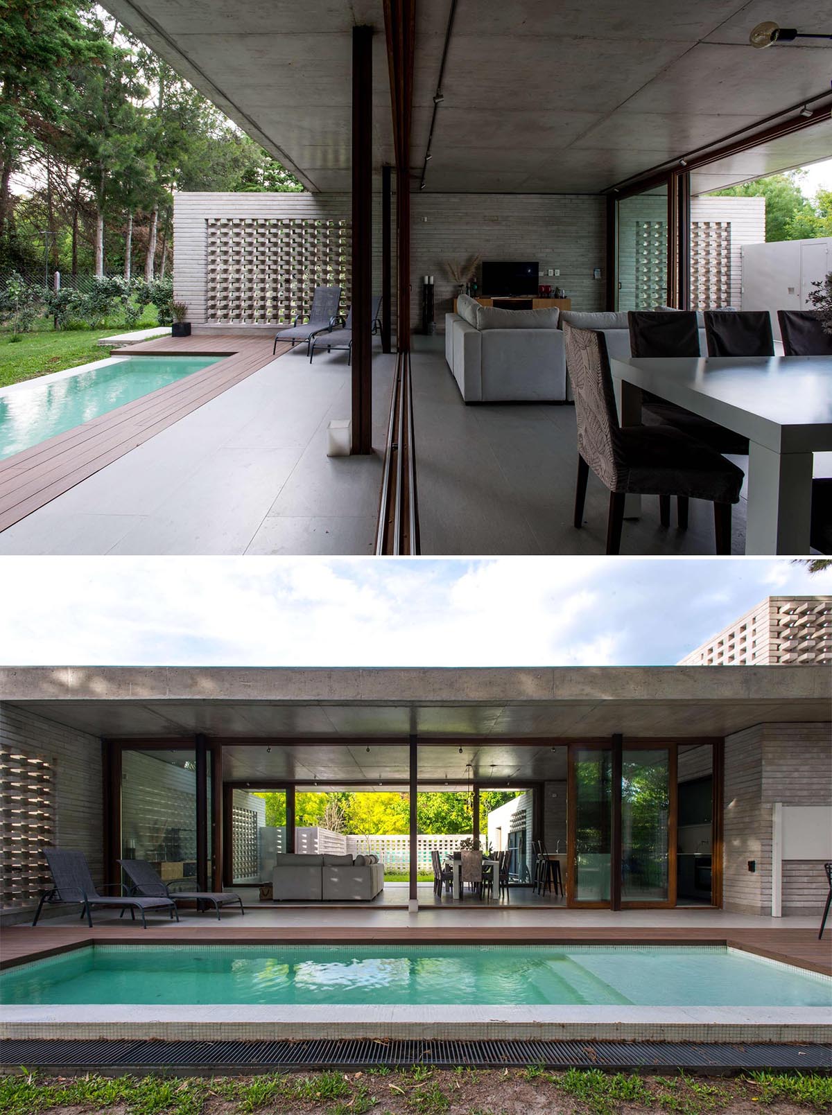 A modern concrete home with sliding glass walls and a swimming pool.