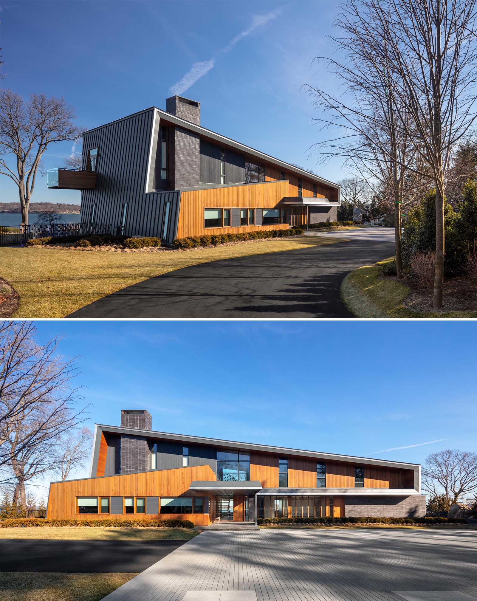 A modern house with a metal roof that wraps onto the walls of the home.