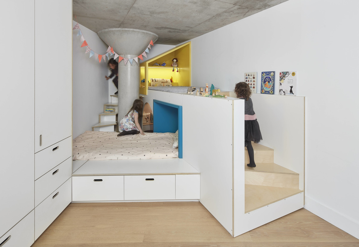 A fun custom-designed bedroom for two small children.