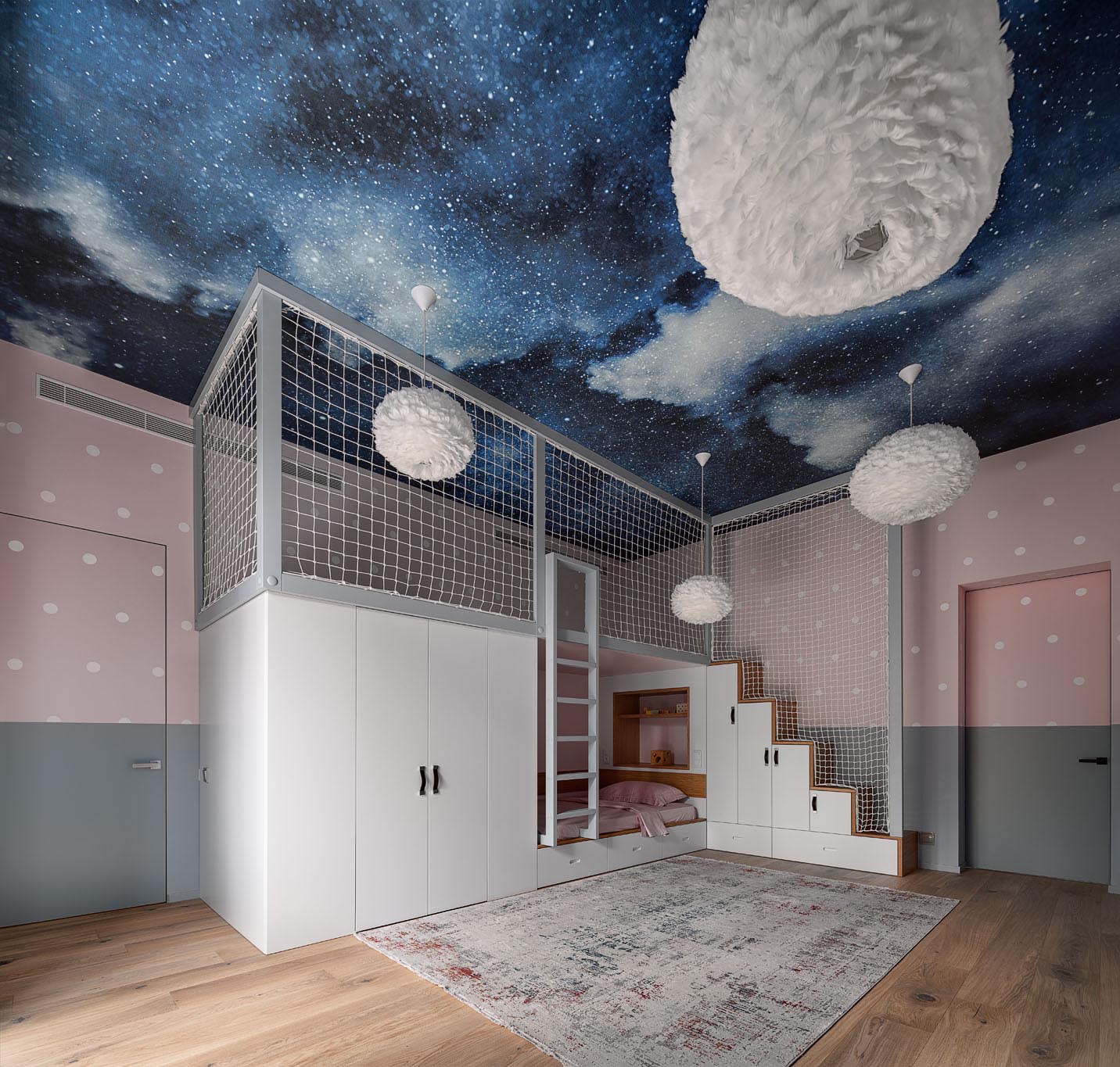 The lower section of this fun kid's bedroom includes stairs with storage and a ladder, both of which provide access to the upper loft level, while netting has been added to the frame for safety.