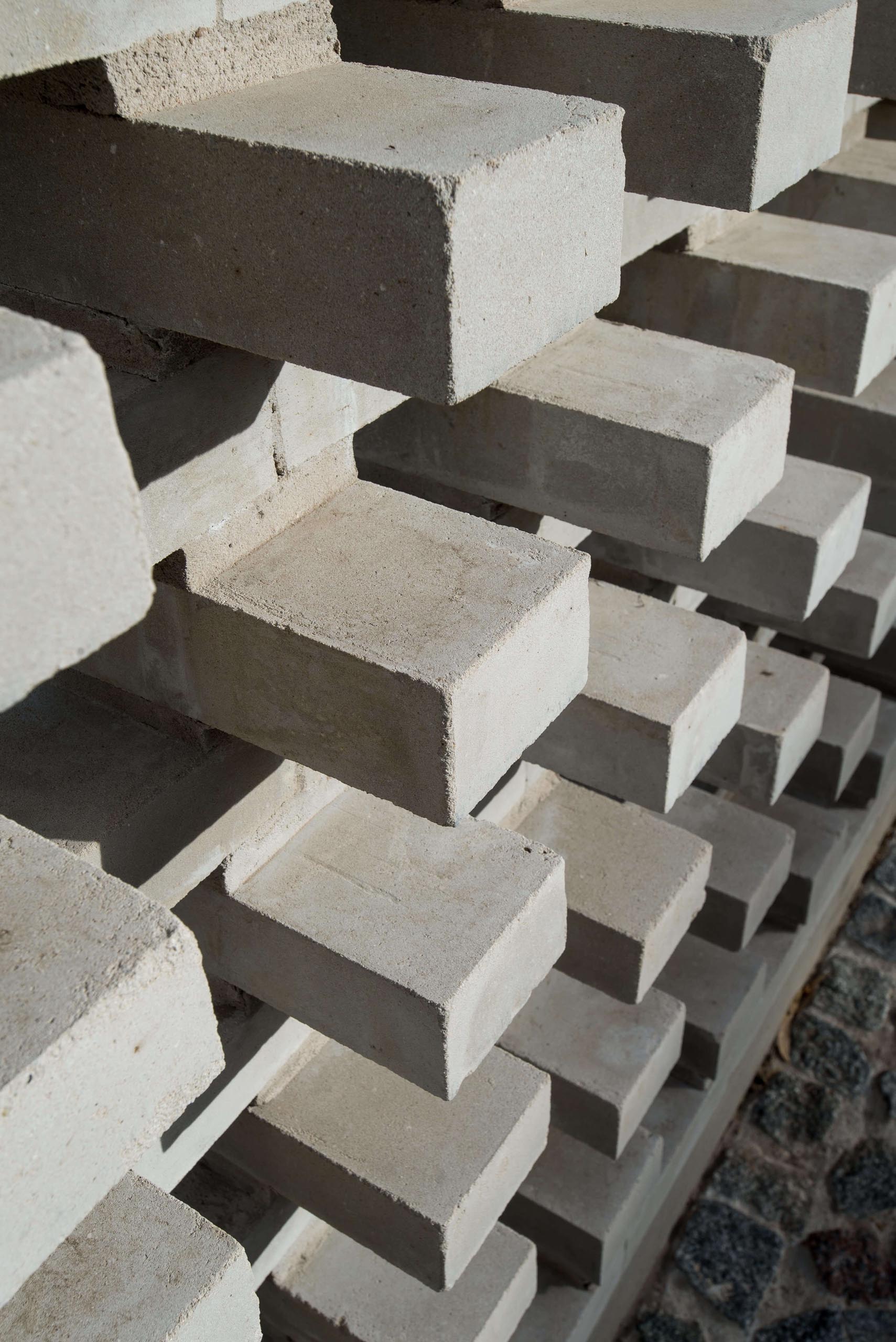 A closeup look at a modern concrete block wall that provides privacy.