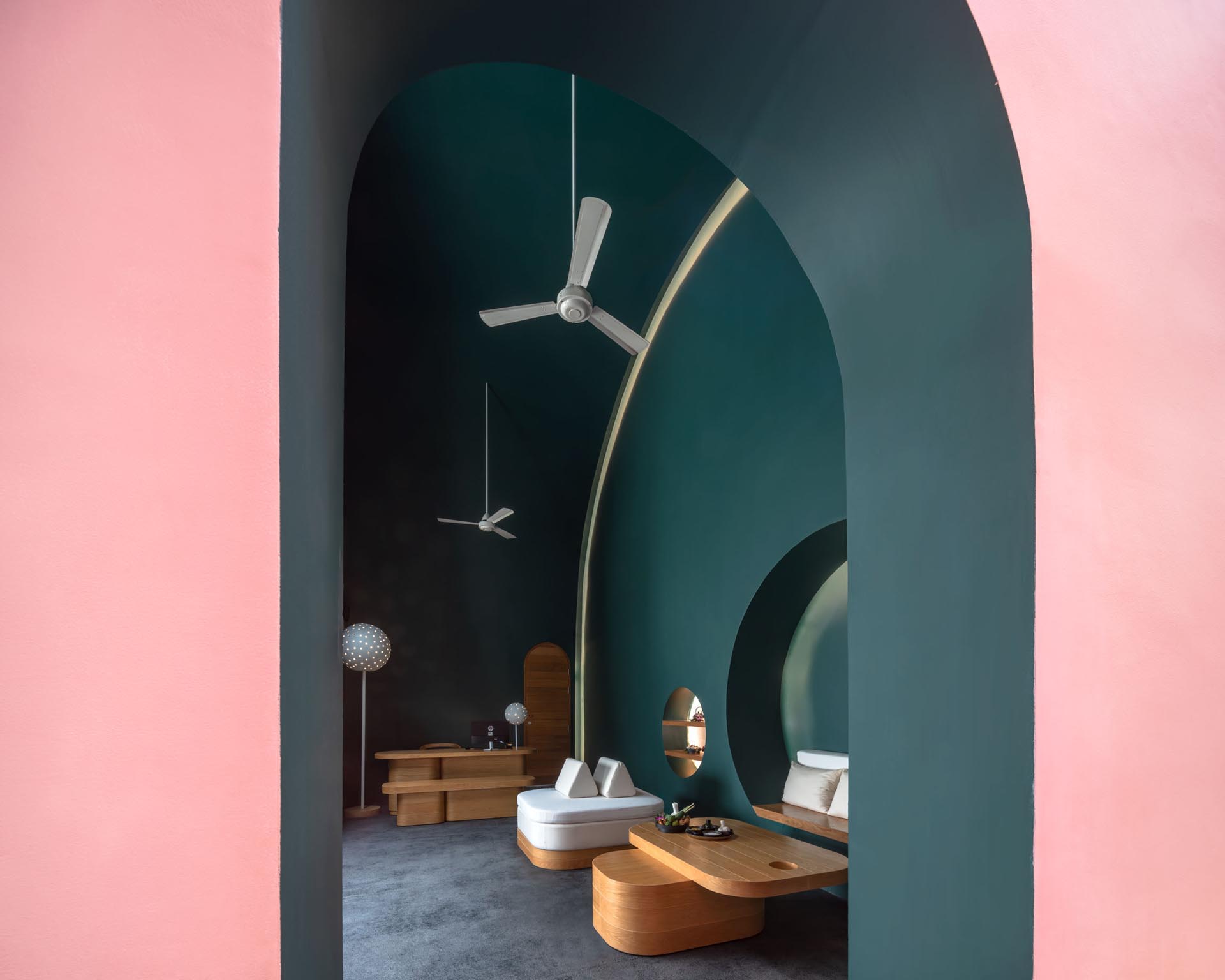 Dark green and light pink walls in a hotel spa.