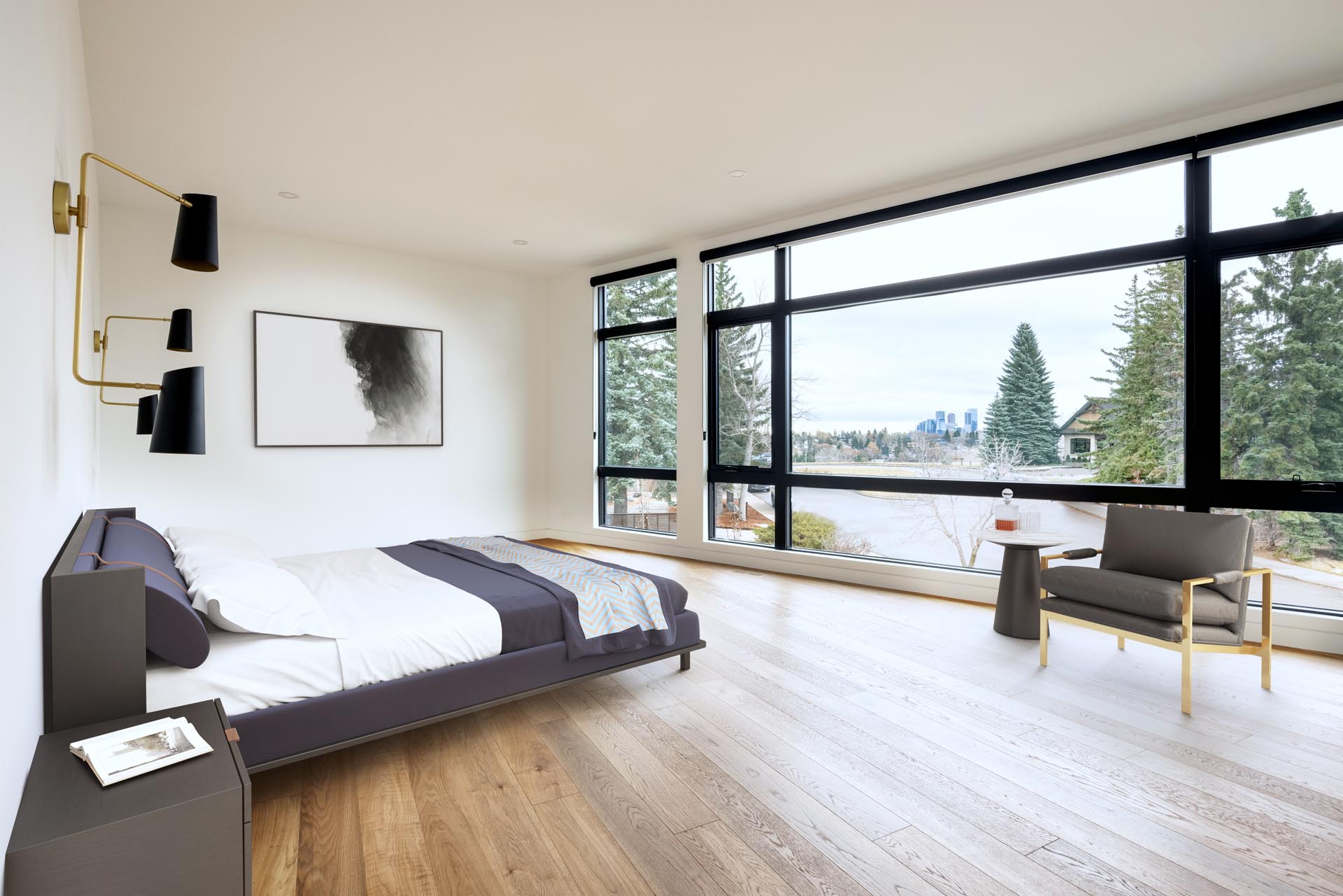 In this primary bedroom, bronze and black lighting has been mounted to the wall on either side of the bed, while the windows provide views of the neighborhood.