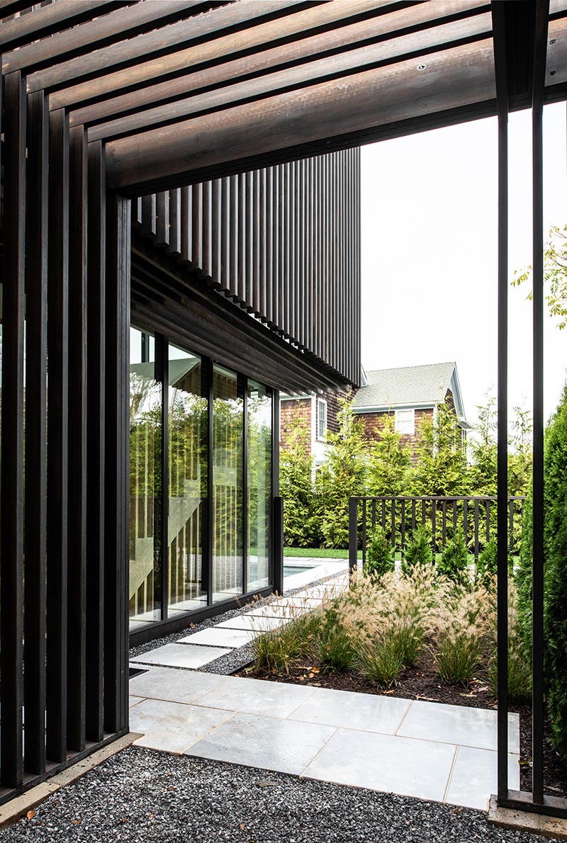 A landscaped garden with a path that connects the front of the home with the rear yard.